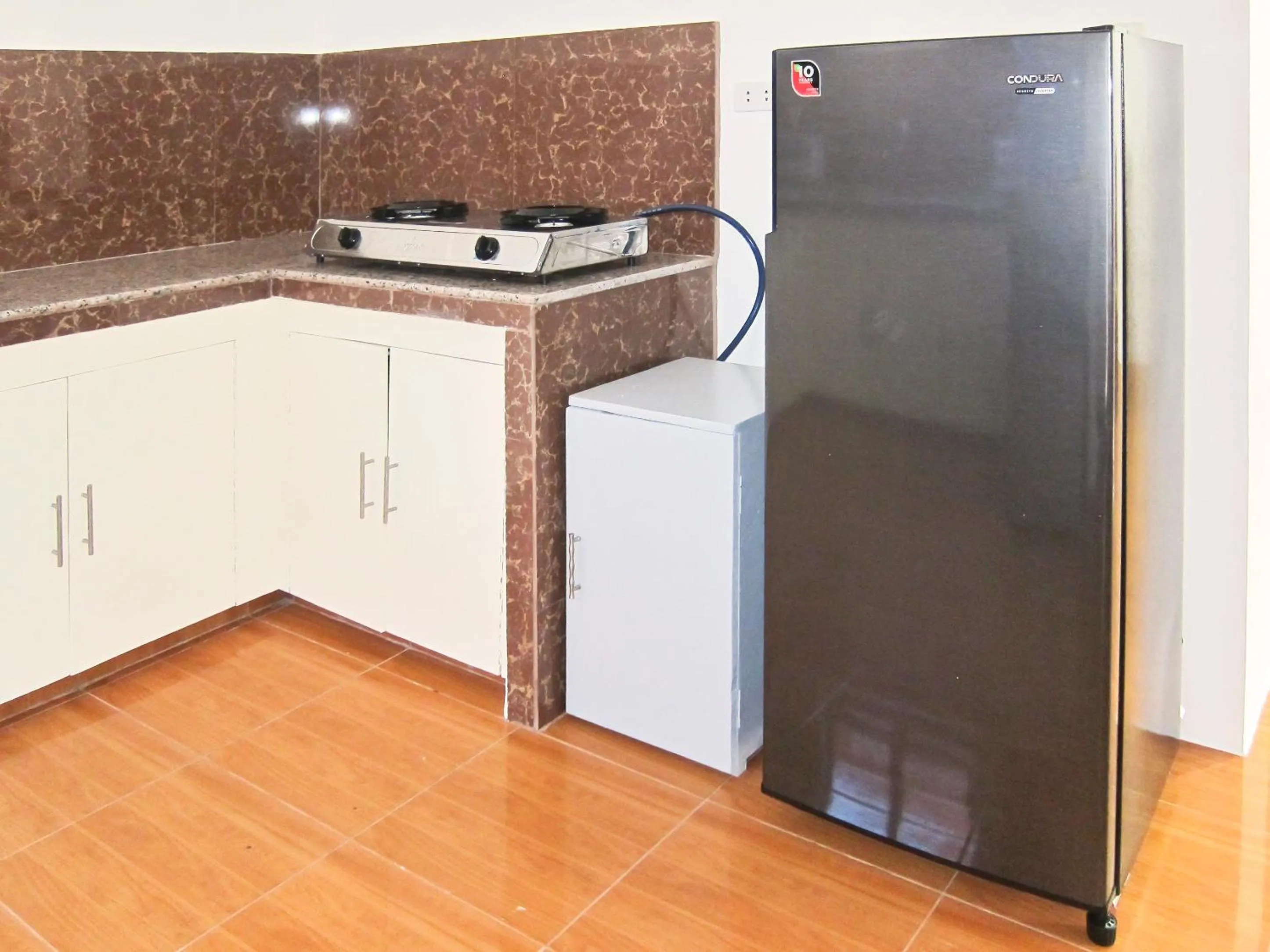 Kitchen or kitchenette in SMAK's Hotel