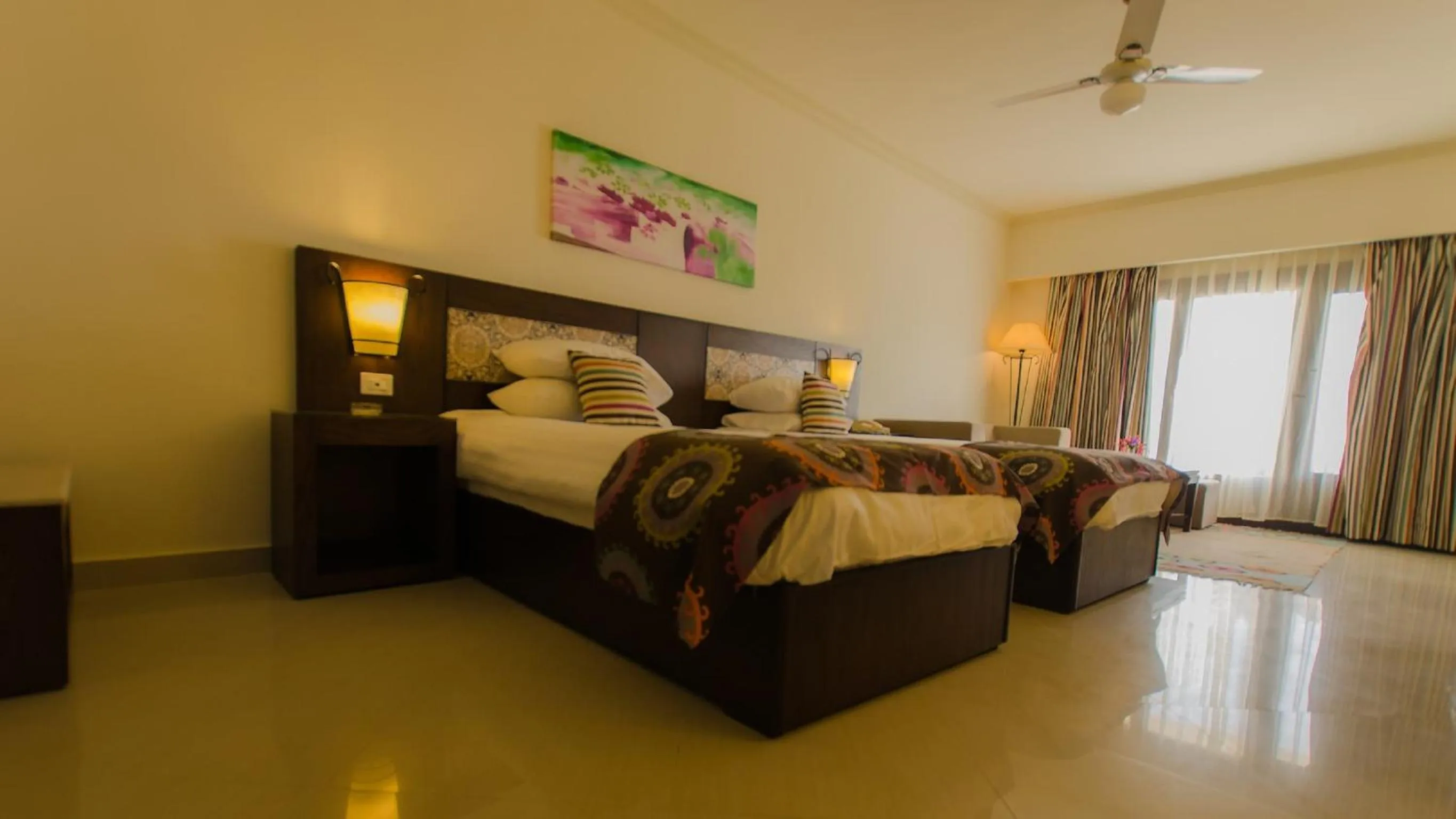 Bed in Lotus Bay Resort
