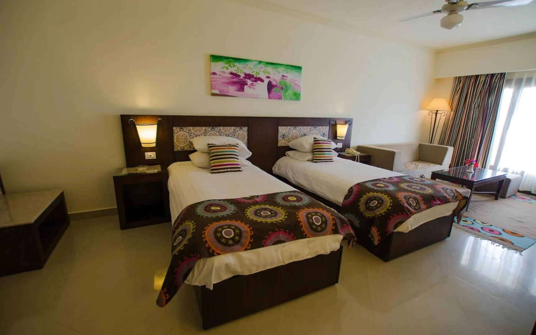 Bed in Lotus Bay Resort