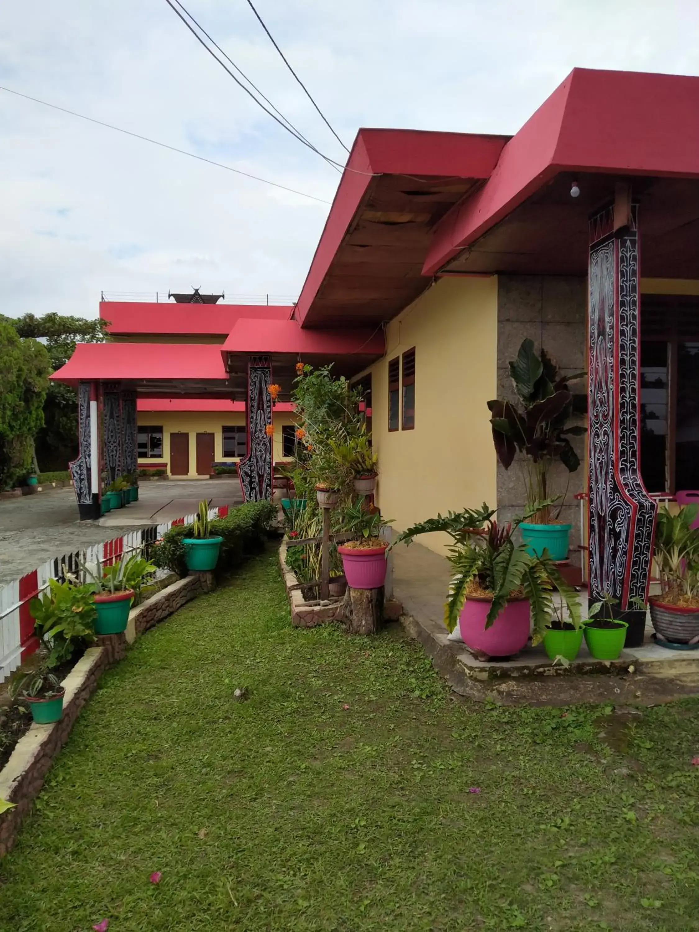 Property building in Hotel Olibert Parapat Ajibata Mitra RedDoorz Property building in Hotel Olibert Parapat Ajibata Mitra RedDoorz