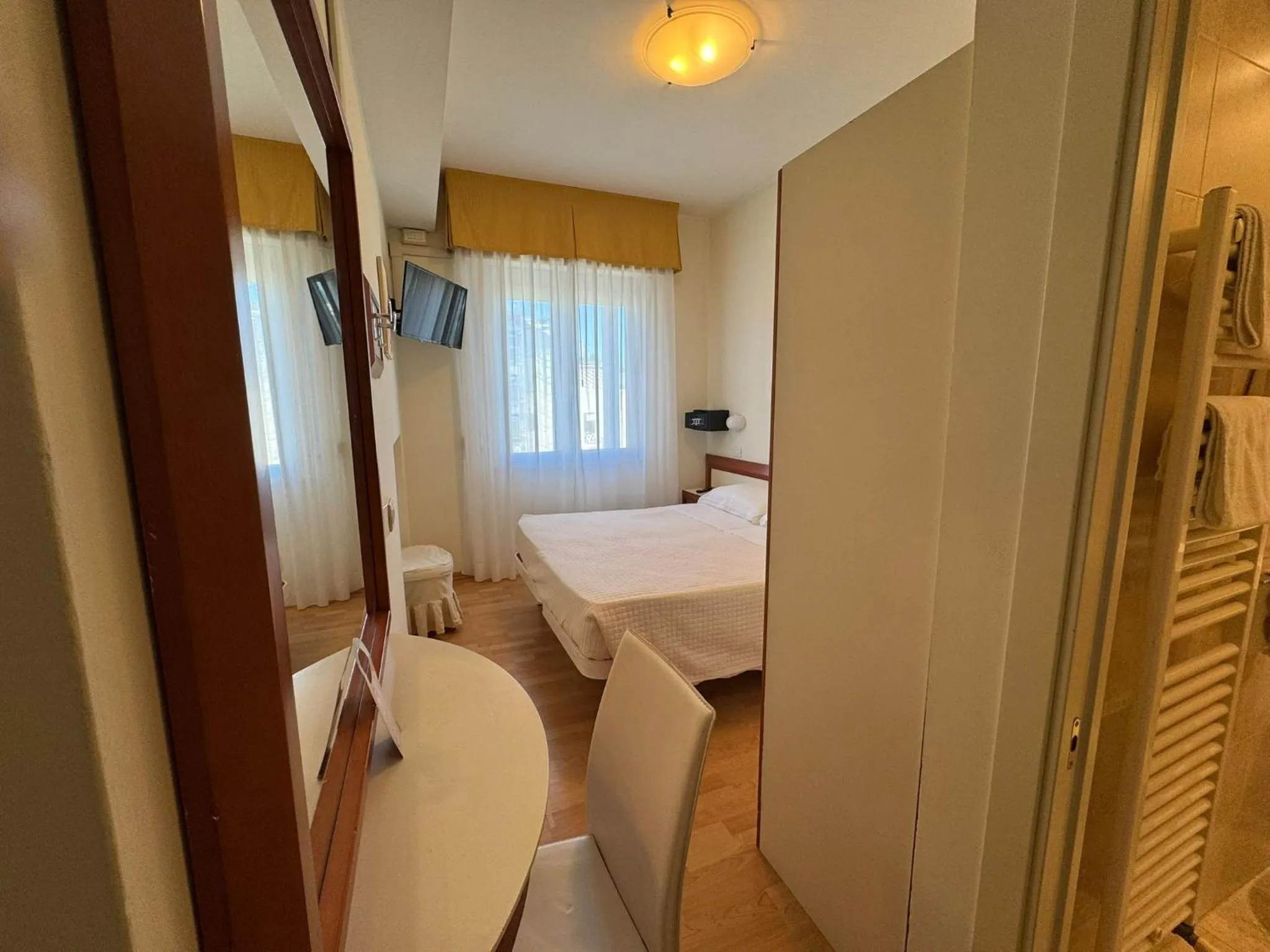 Bed in Hotel Aristeo