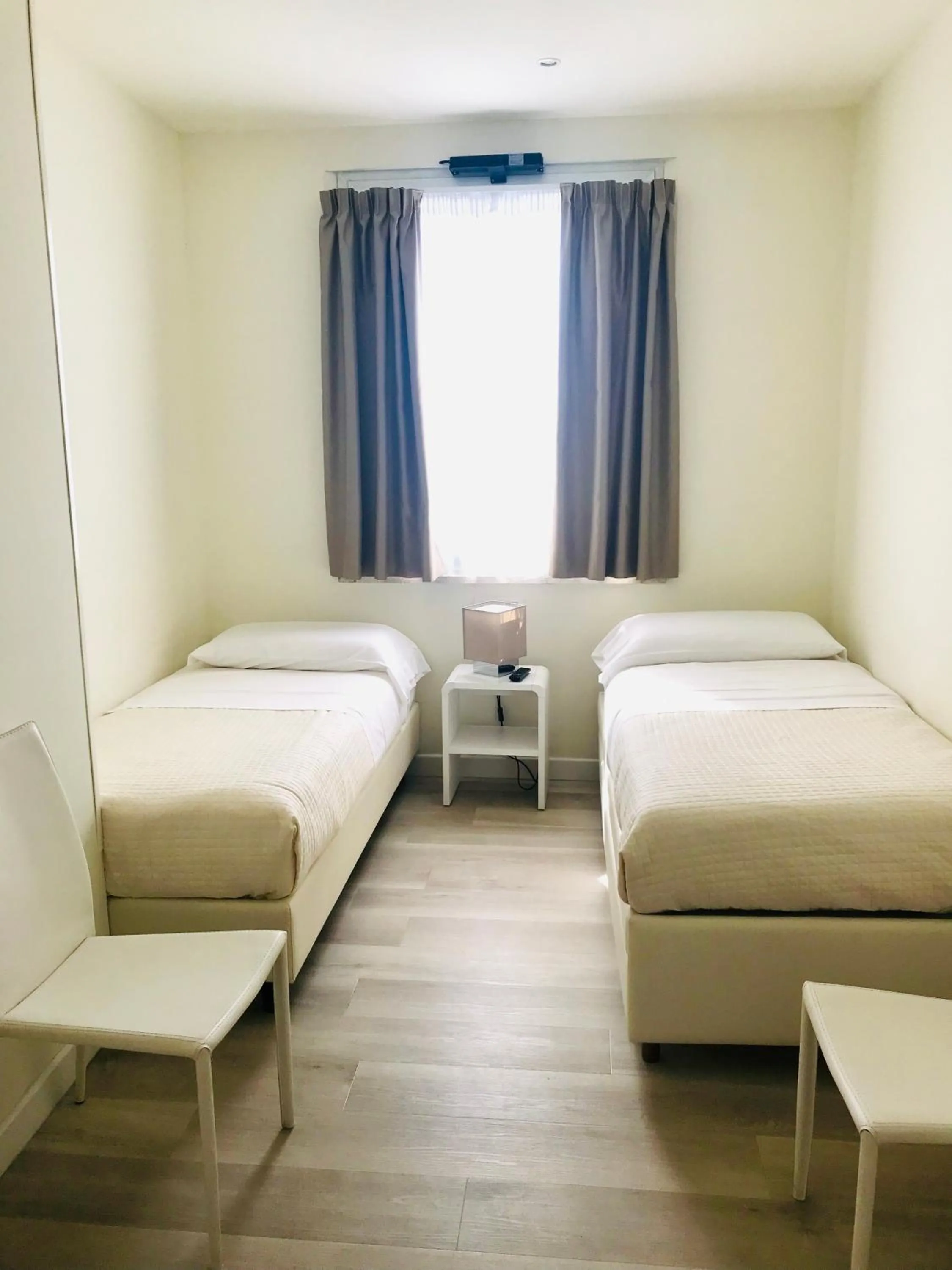 Bed in Hotel Aristeo