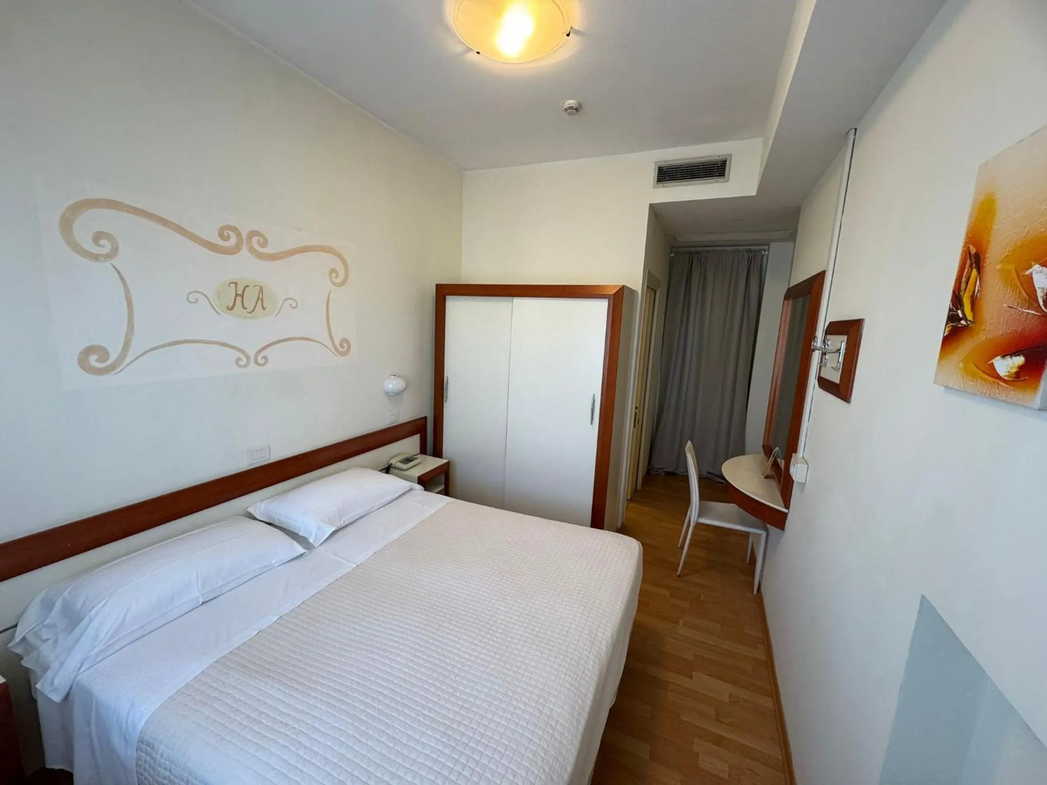 Bed in Hotel Aristeo