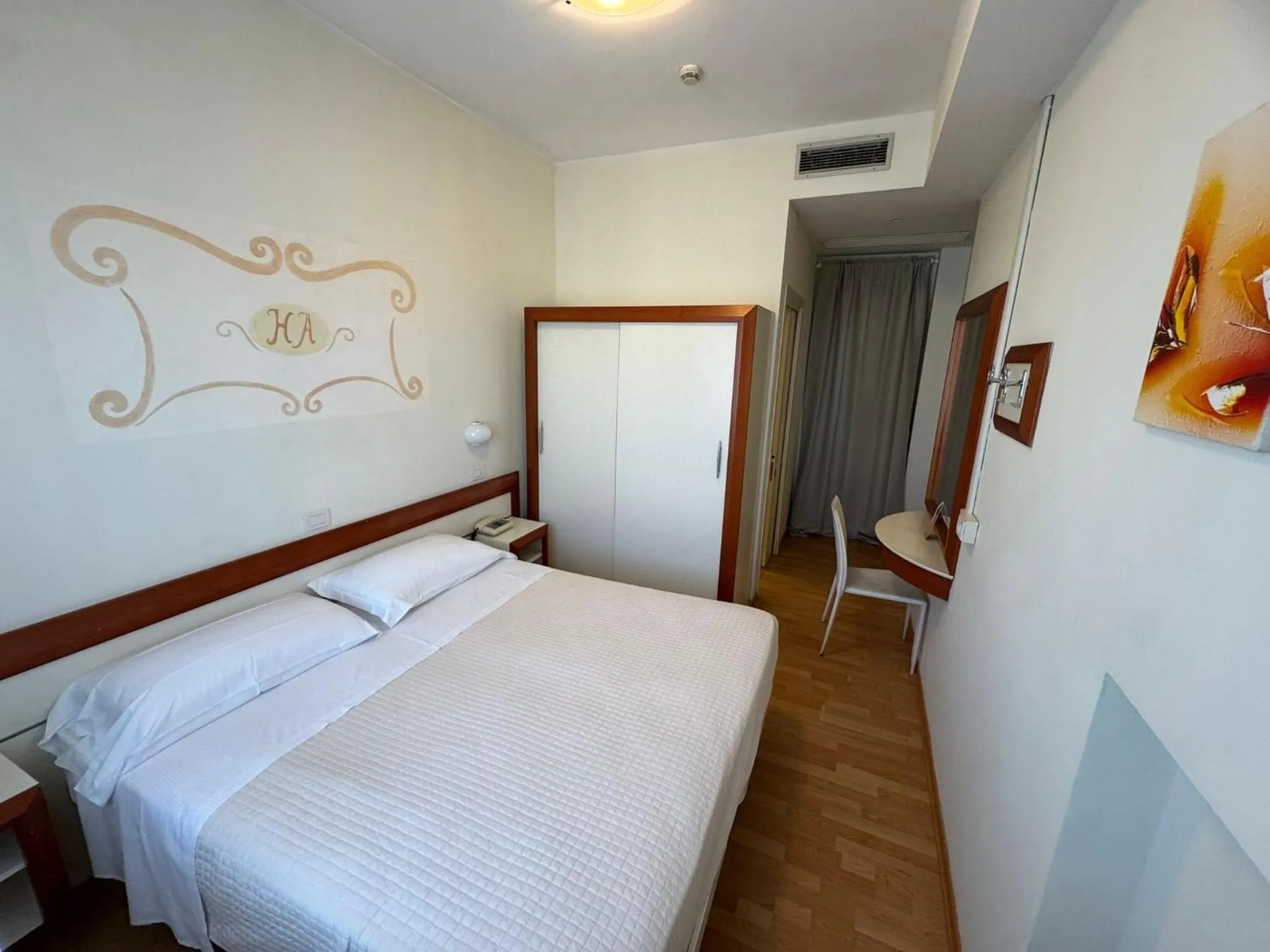 Bed in Hotel Aristeo