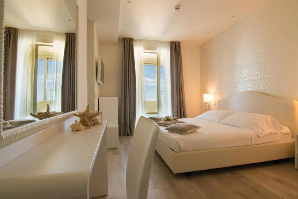 Bed in Hotel Aristeo