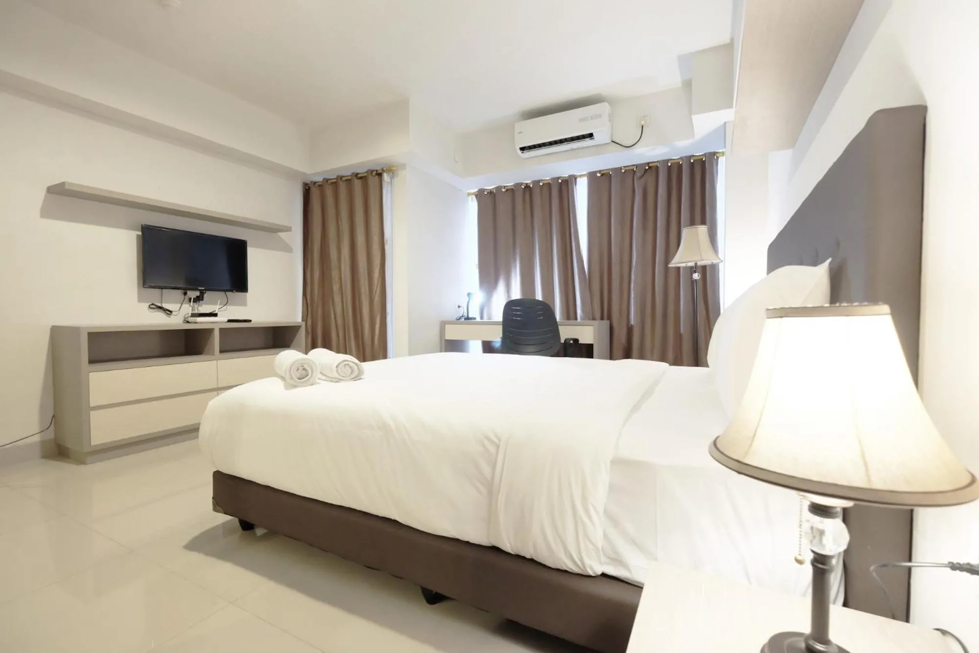 Best Price Minimalist Studio Apartment at The H Residence By Travelio