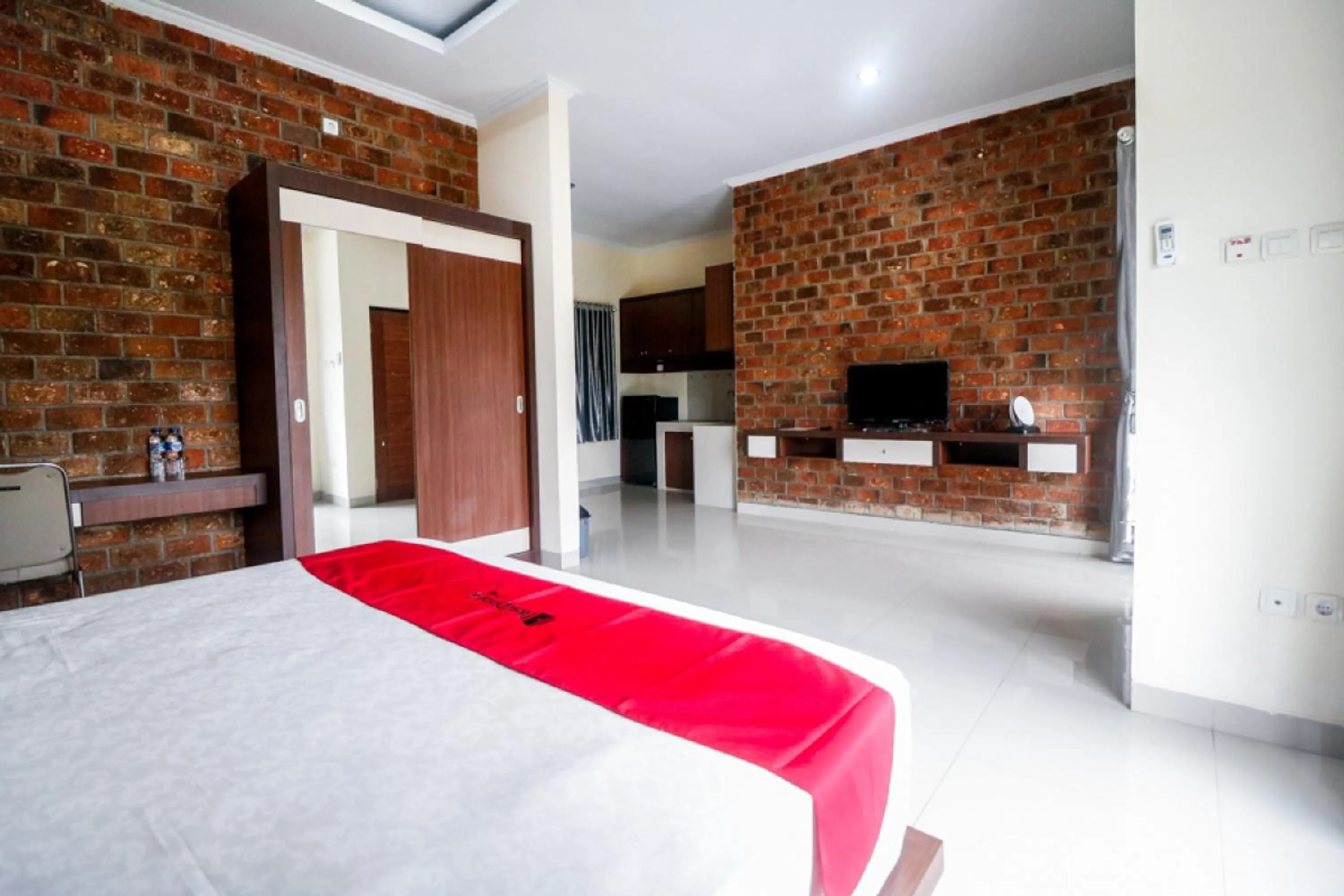 Bed in RedDoorz Plus near Kualanamu Airport Medan