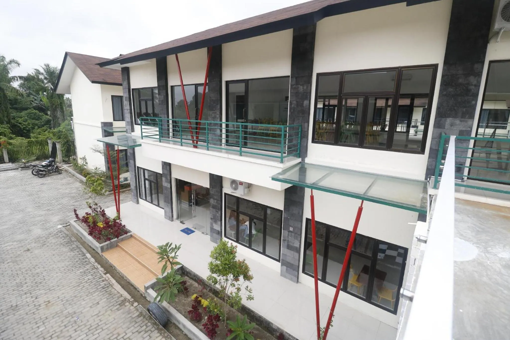 Property building in RedDoorz Plus near Kualanamu Airport Medan