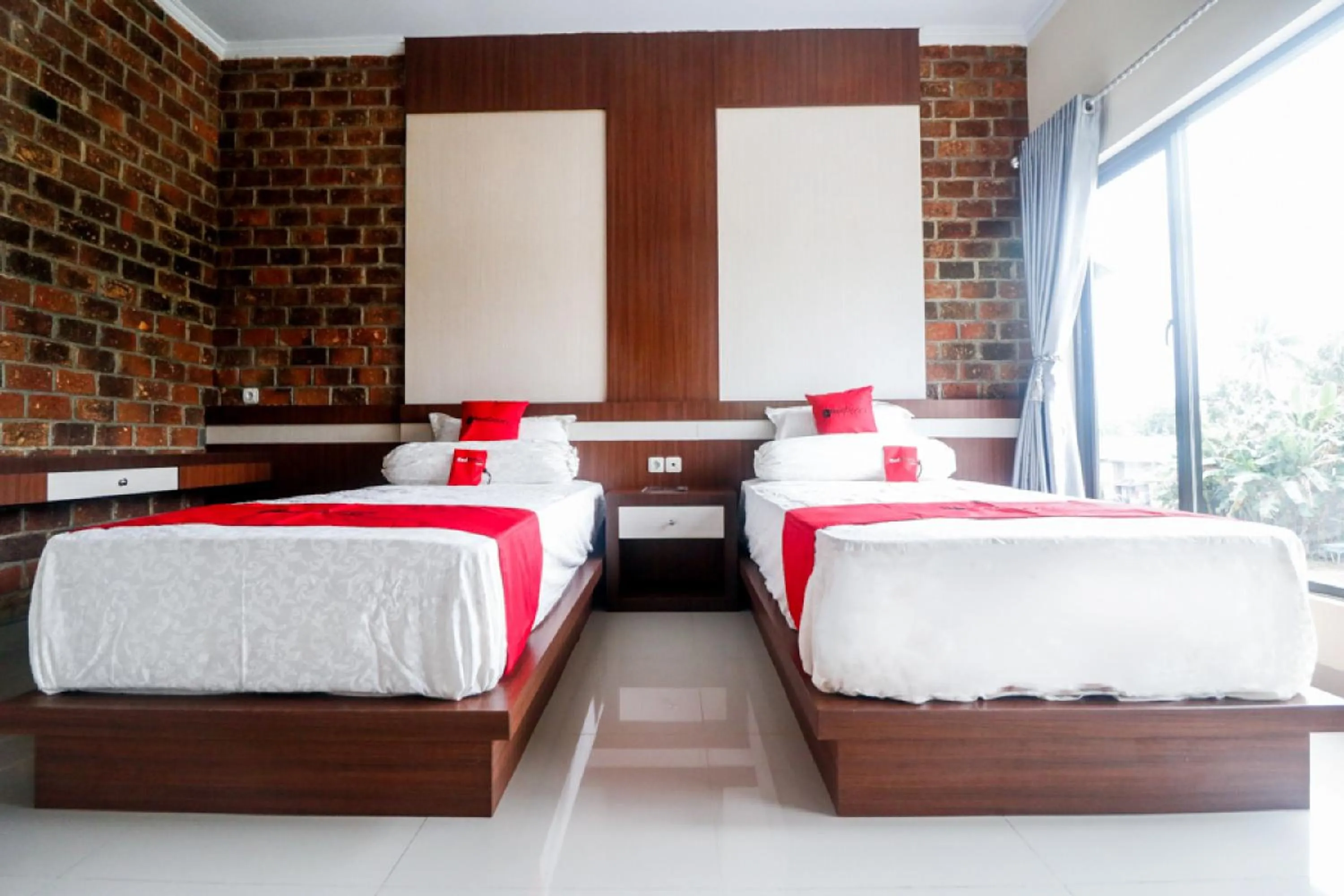 Bed in RedDoorz Plus near Kualanamu Airport Medan