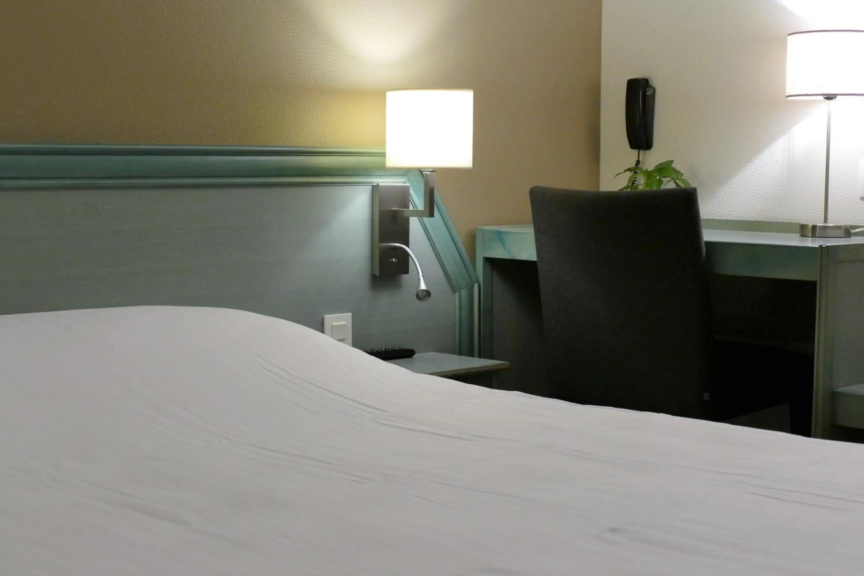 Bed in Au Relais de l'Ill