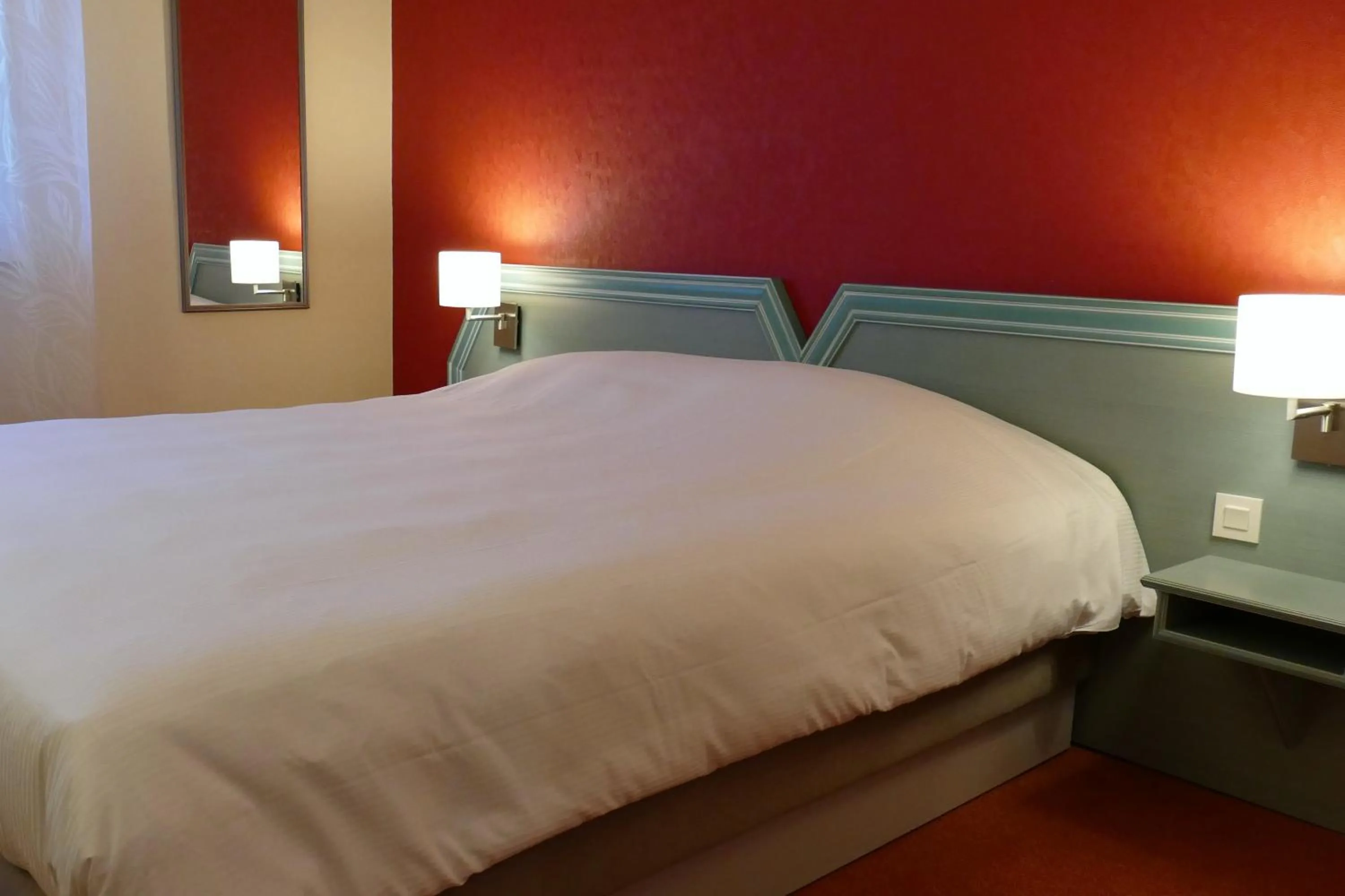 Bed in Au Relais de l'Ill