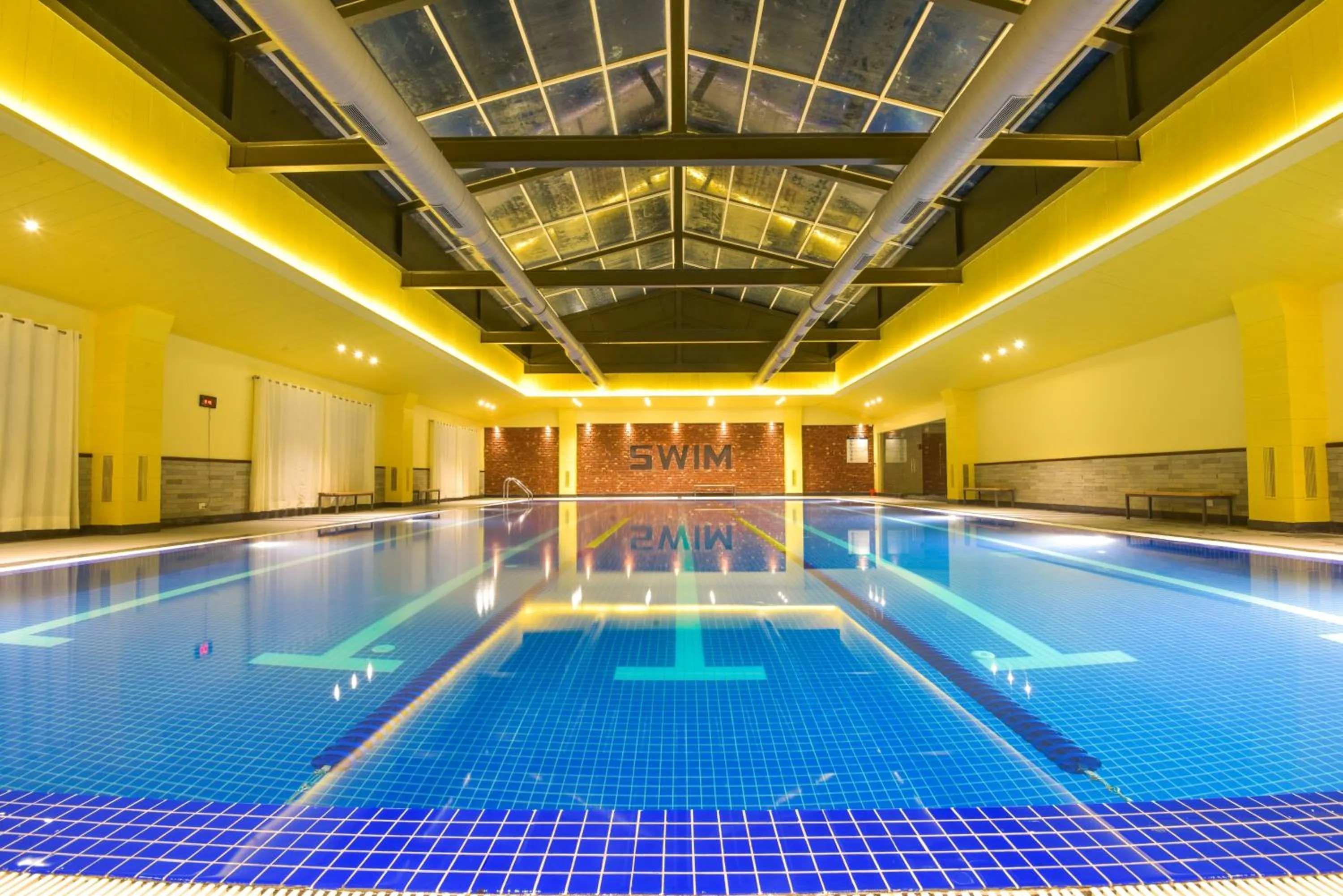 Swimming pool in Infinitea Tea Garden Resort