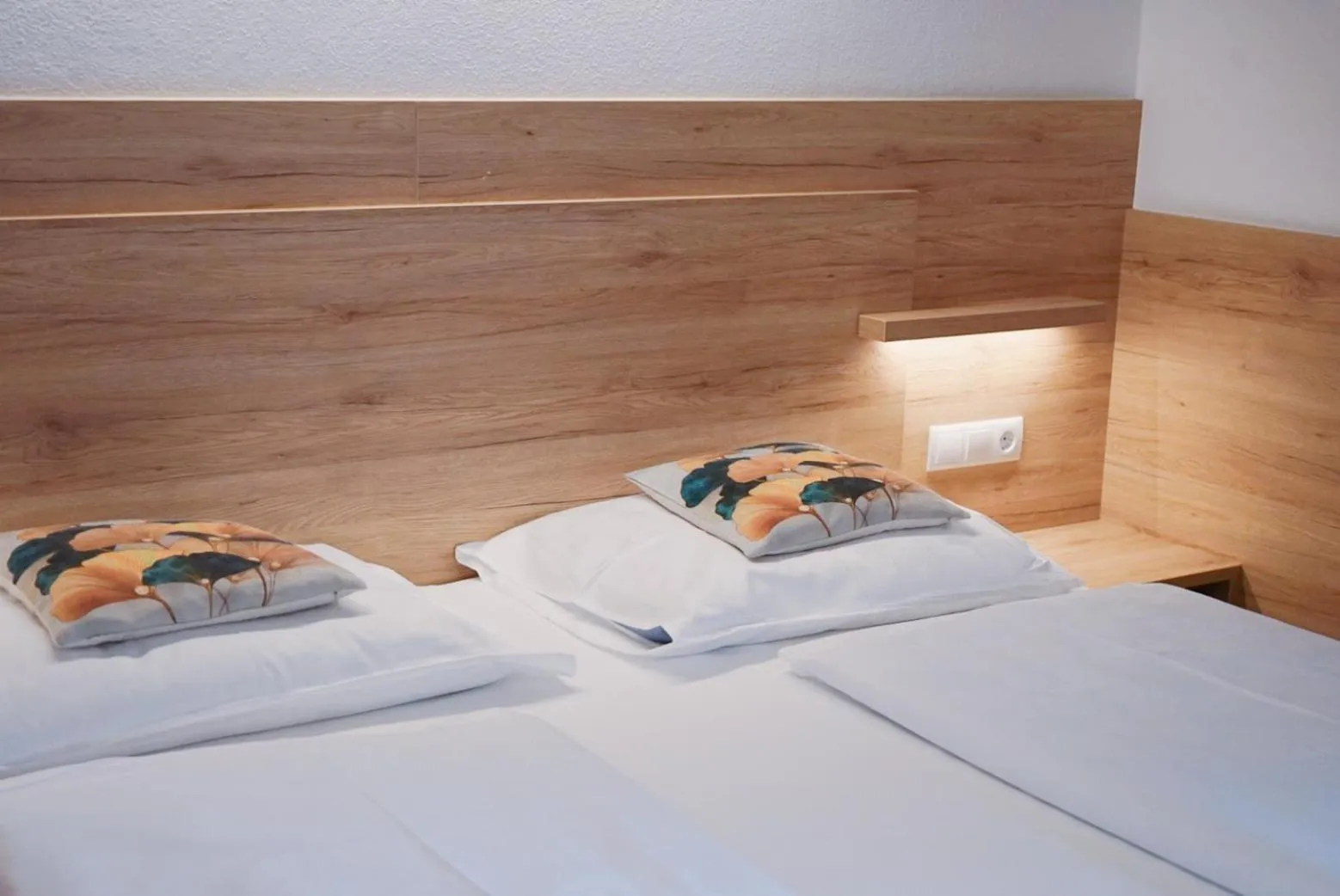 Bed in Hotel Gisserhof - Dolomea Hotel