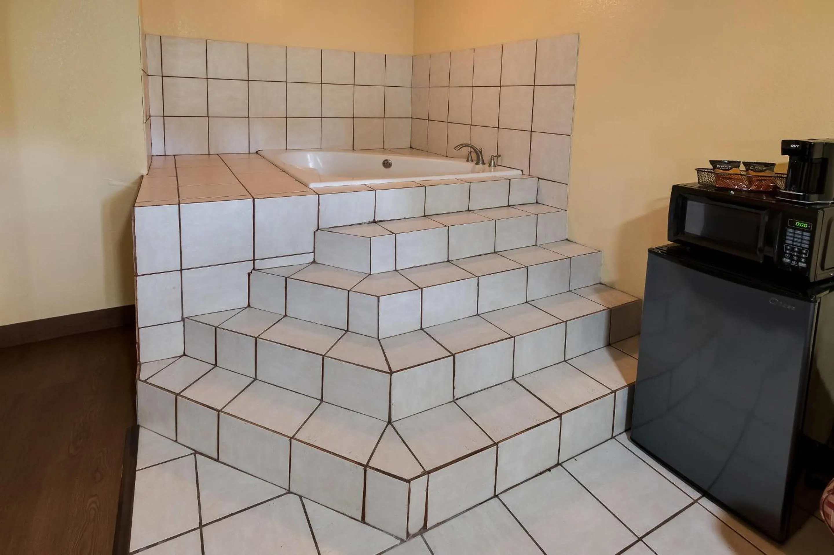 Bedroom in Rodeway Inn & Suites New Orleans East