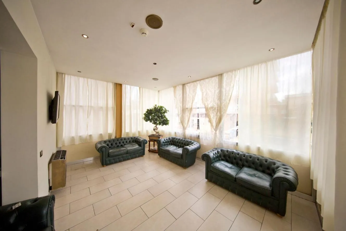 Communal lounge/ TV room in Hotel Marina Bay