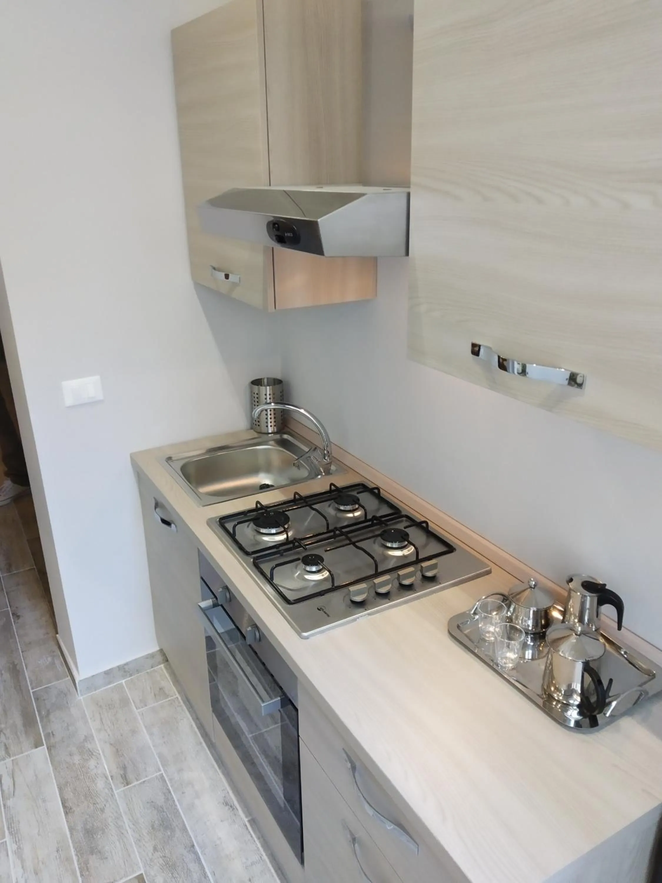 Kitchen or kitchenette in Dimora "I Santi Patroni"