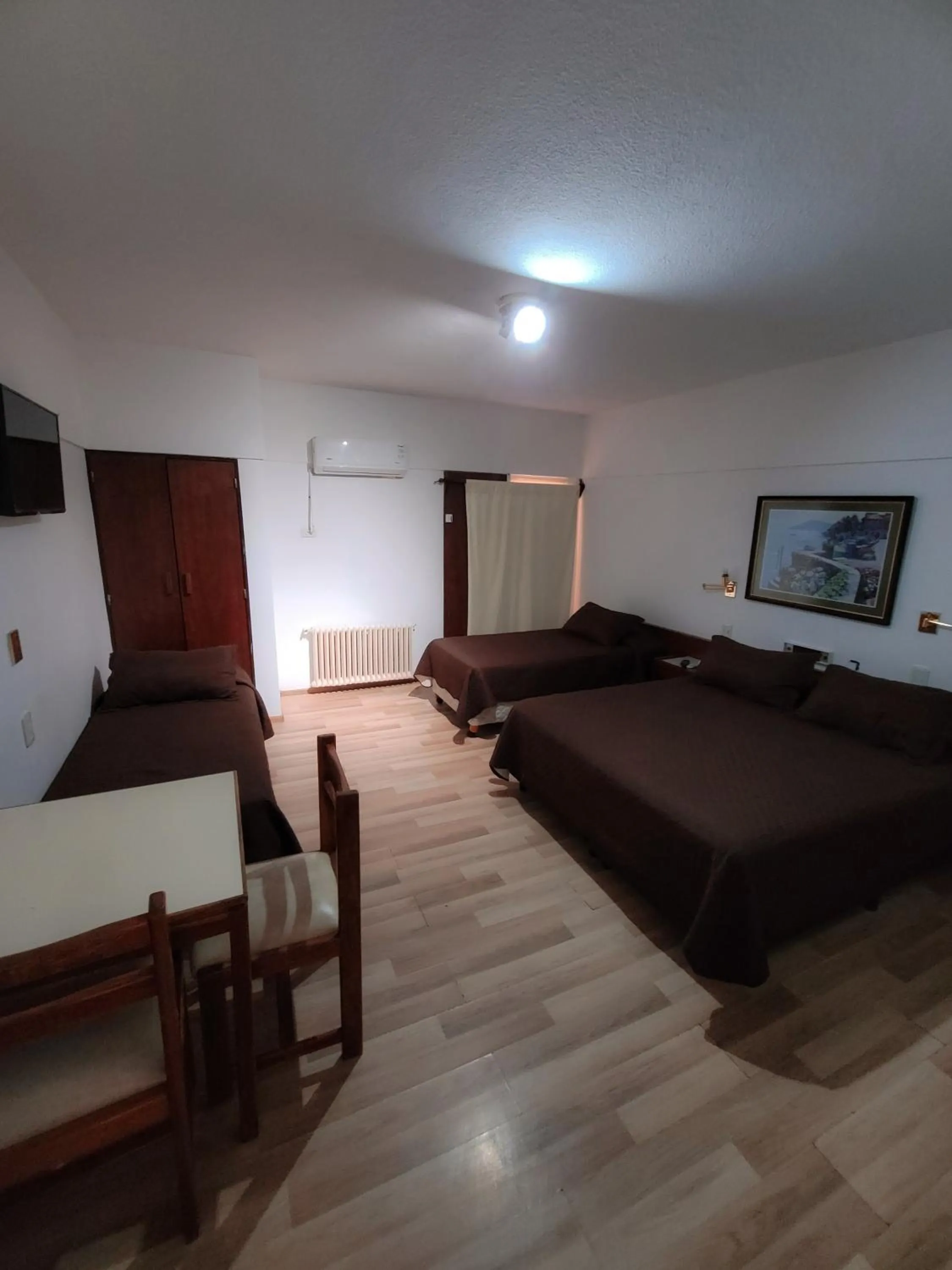 Communal lounge/ TV room, Bed in Hotel Aiello