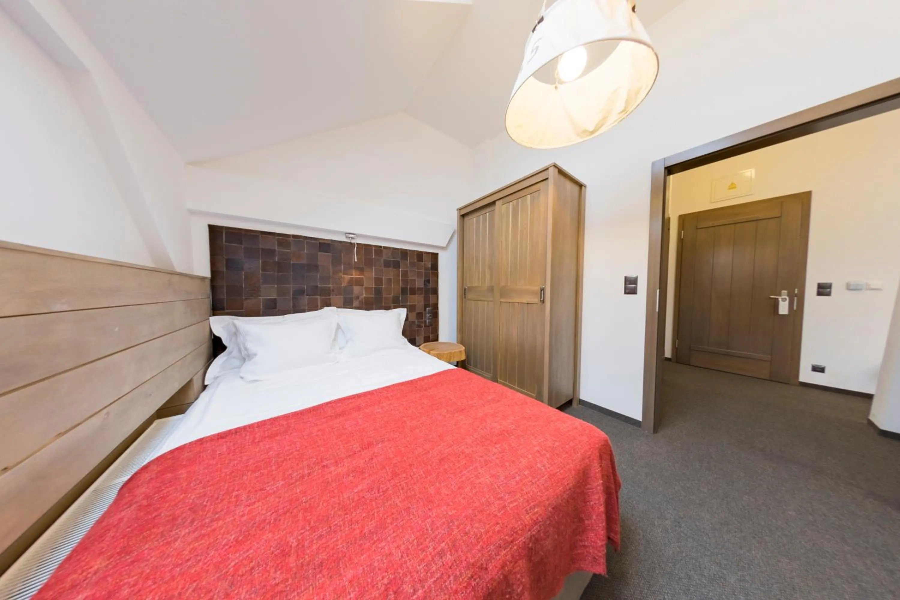 Bed in Hotel Jakubus