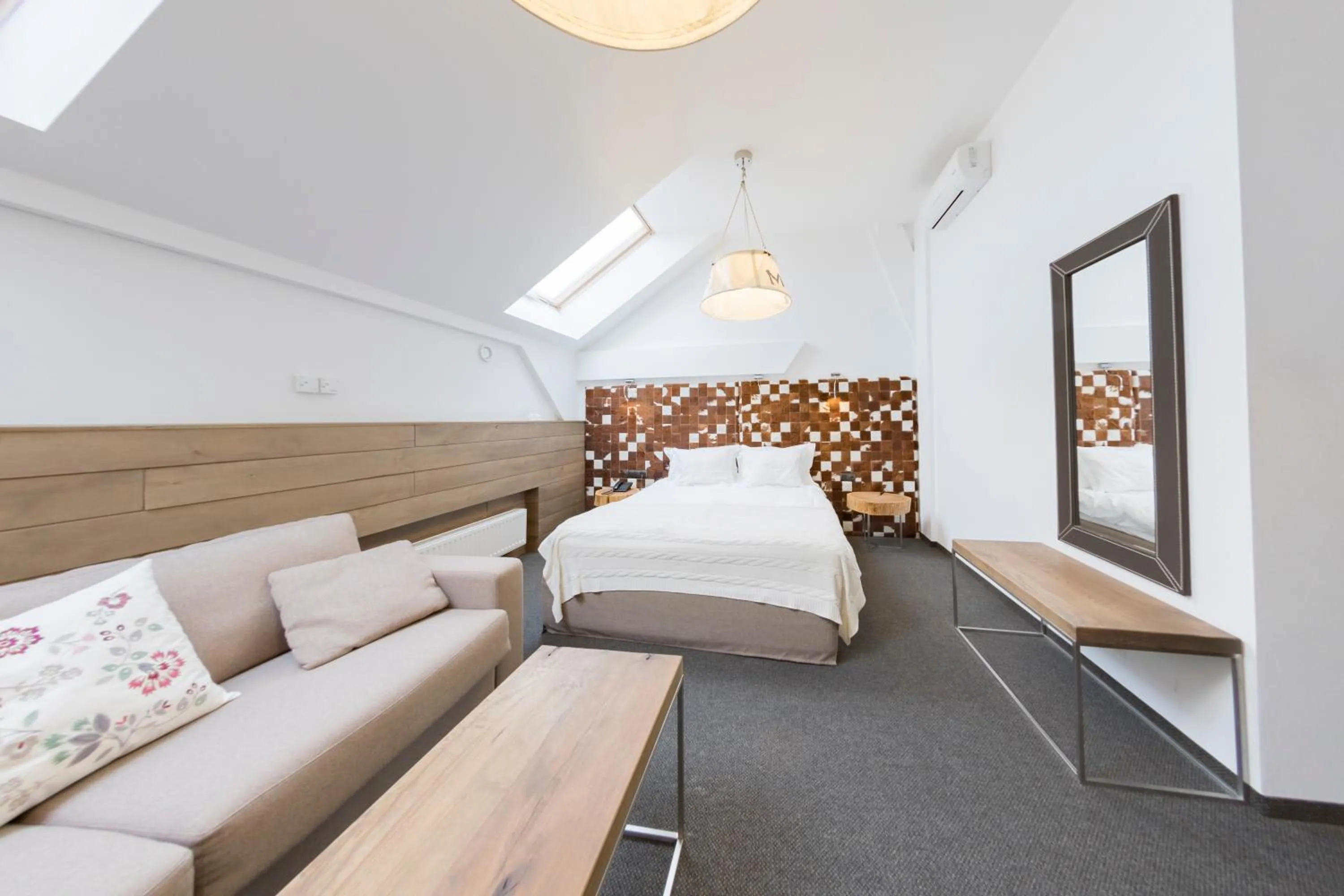 Seating area, Bed in Hotel Jakubus