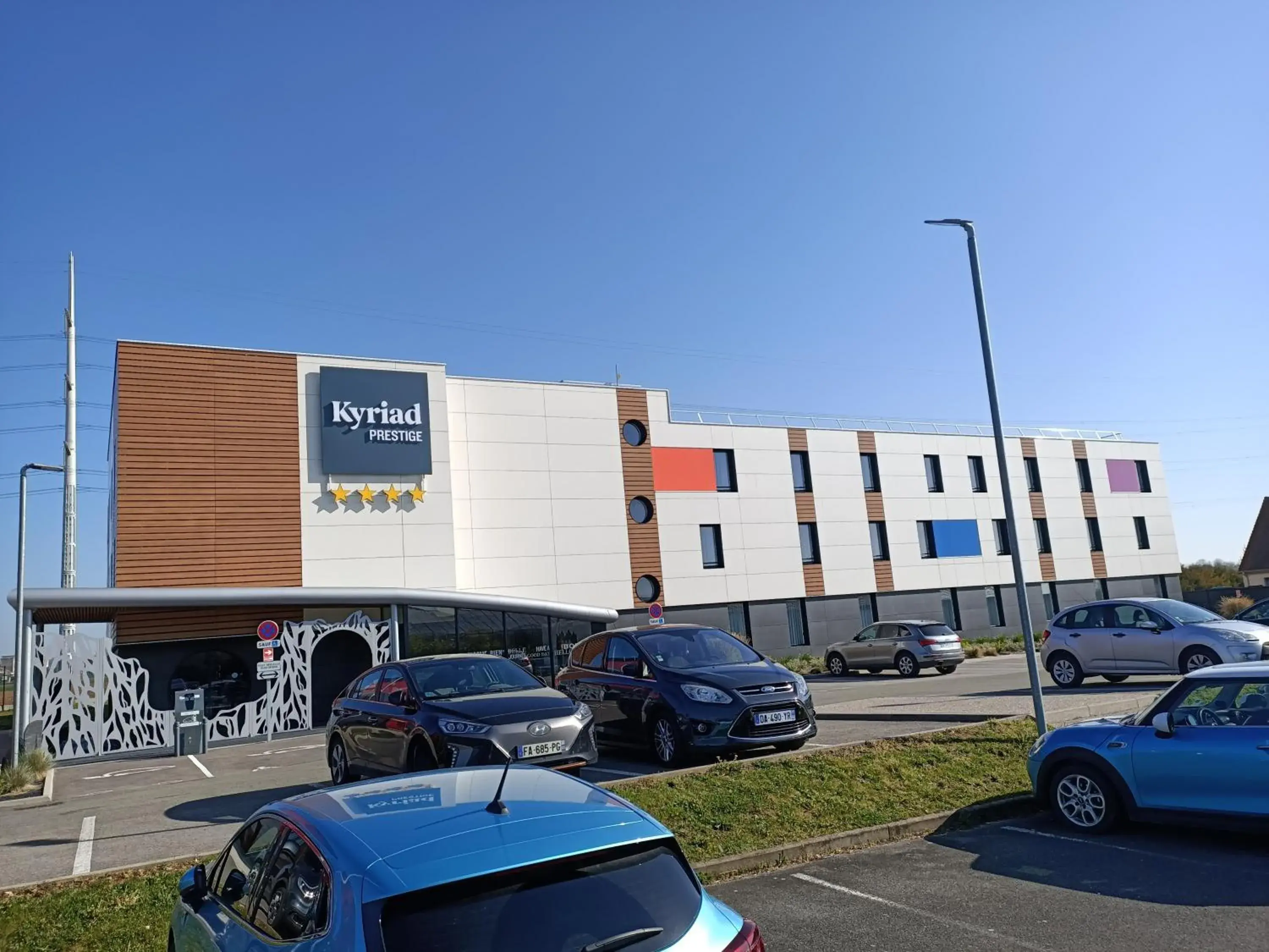 Property building in Kyriad Prestige Amiens Poulainville - Hotel and Spa Property building in Kyriad Prestige Amiens Poulainville - Hotel and Spa