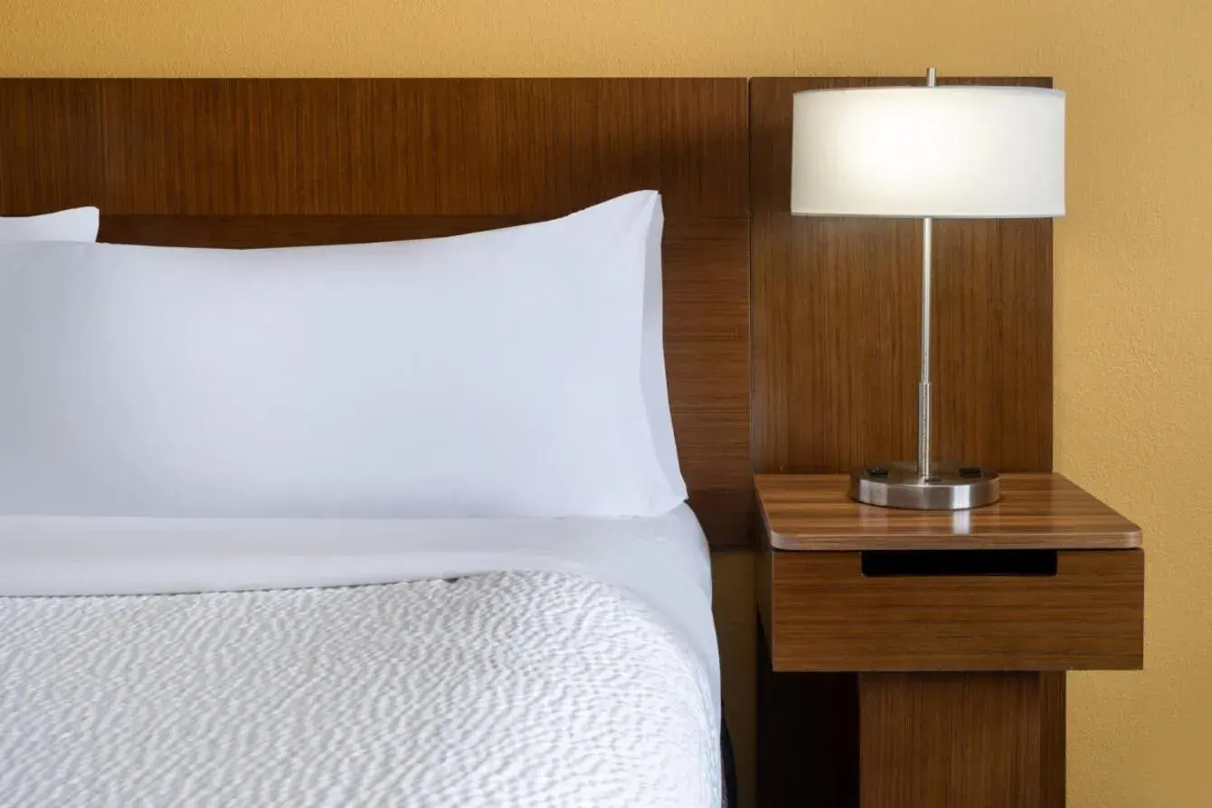 Bed in Sleep Inn & Suites