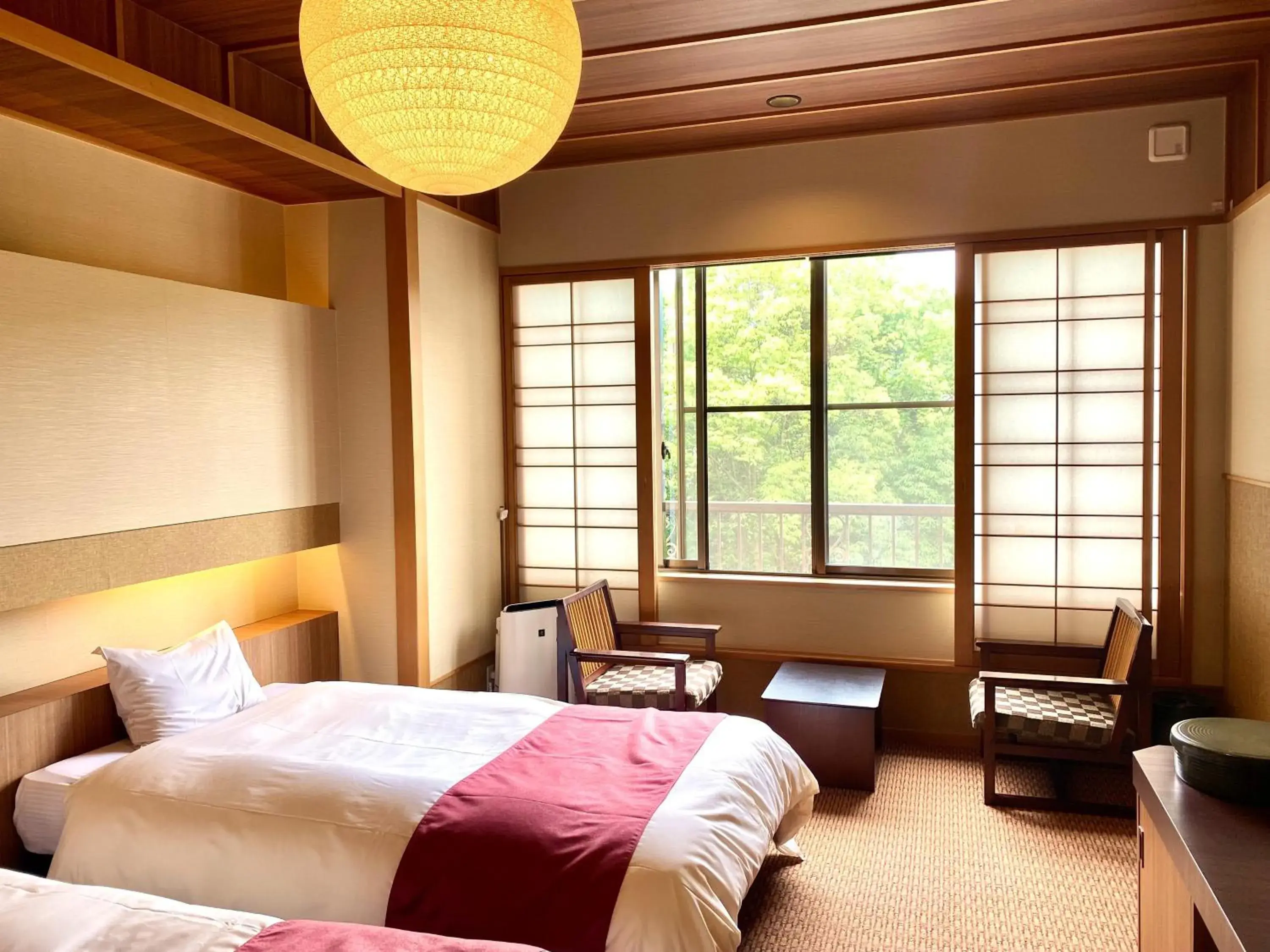 Photo of the whole room, Bed in Ogoto Onsen Yunoyado Komolebi Photo of the whole room, Bed in Ogoto Onsen Yunoyado Komolebi