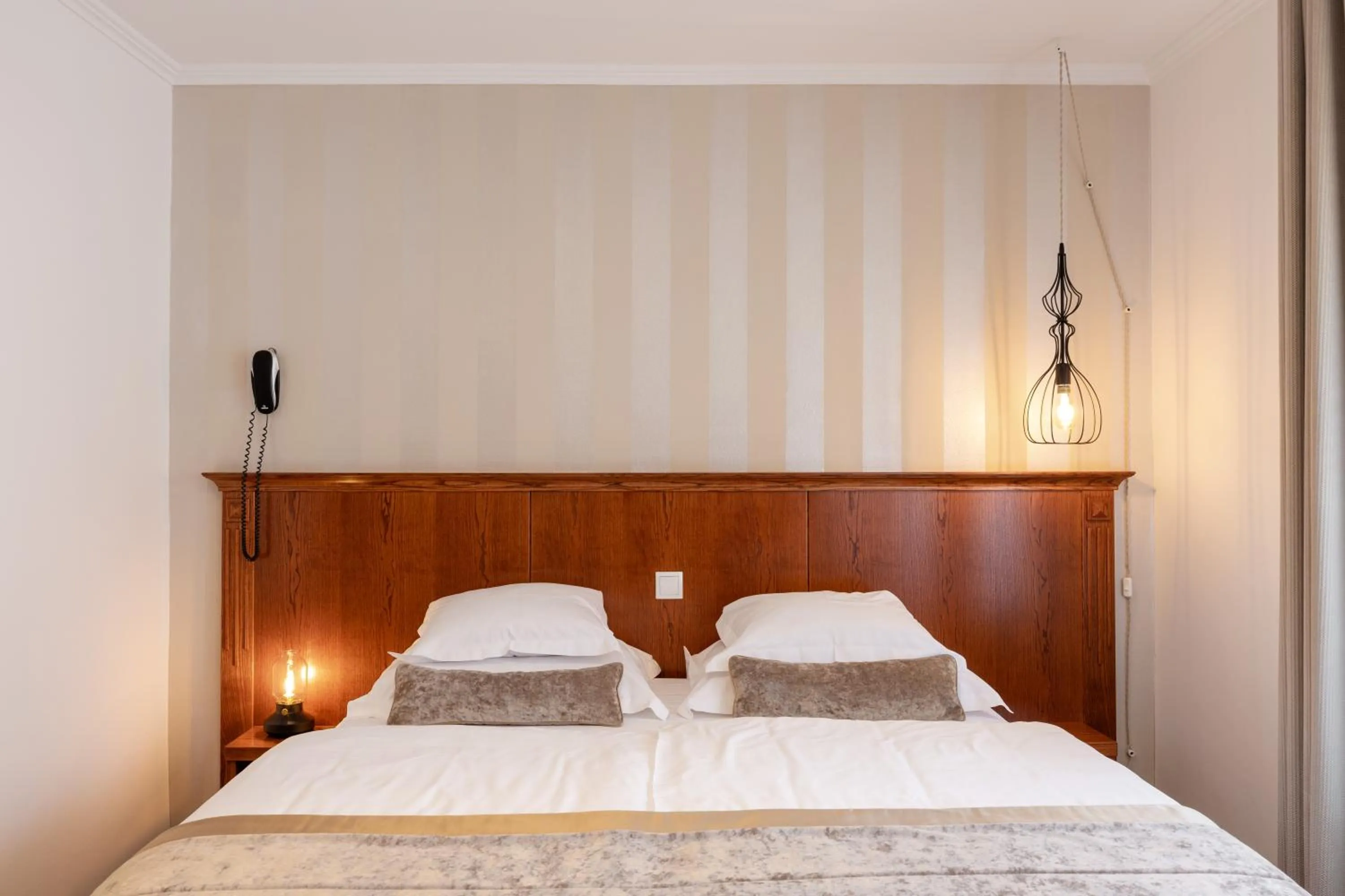 Bed in Kotnik Superior Boutique Hotel