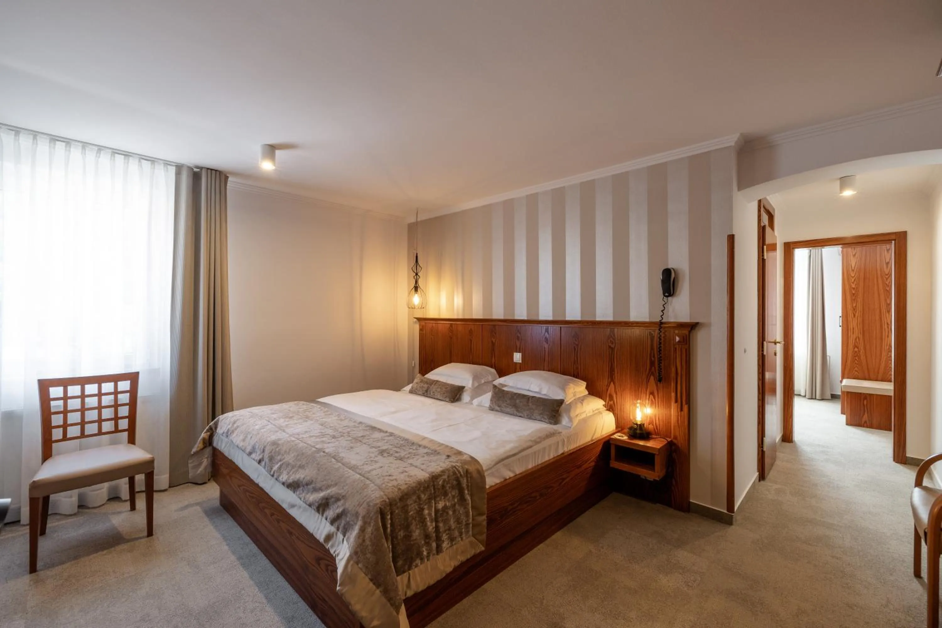 Property building, Bed in Kotnik Superior Boutique Hotel