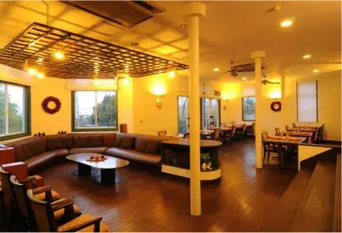 Lounge or bar in Petit Resort Hotel Alcyon Lounge or bar in Petit Resort Hotel Alcyon