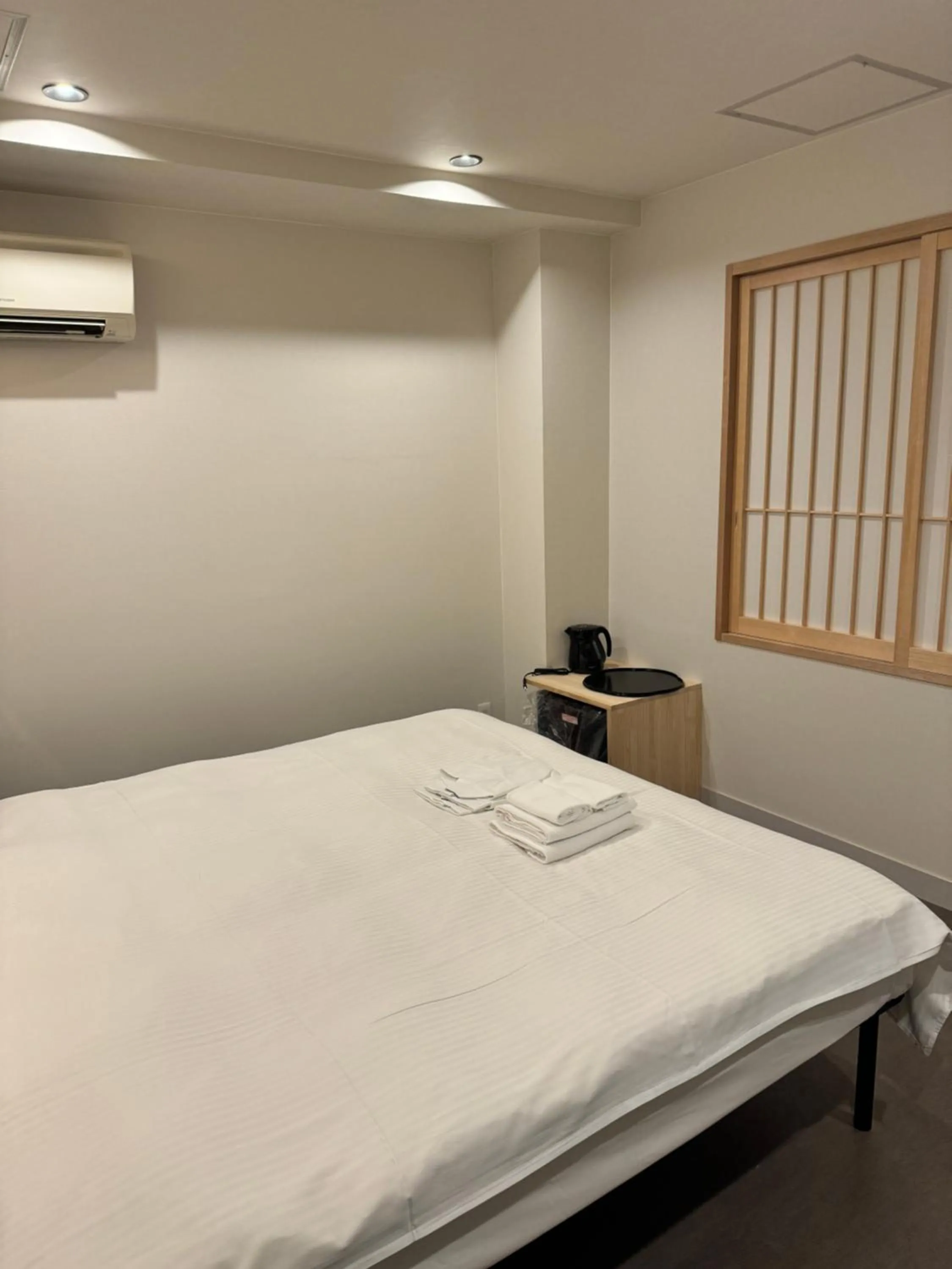 Bed in Hotel Be-zen shimanouchi
