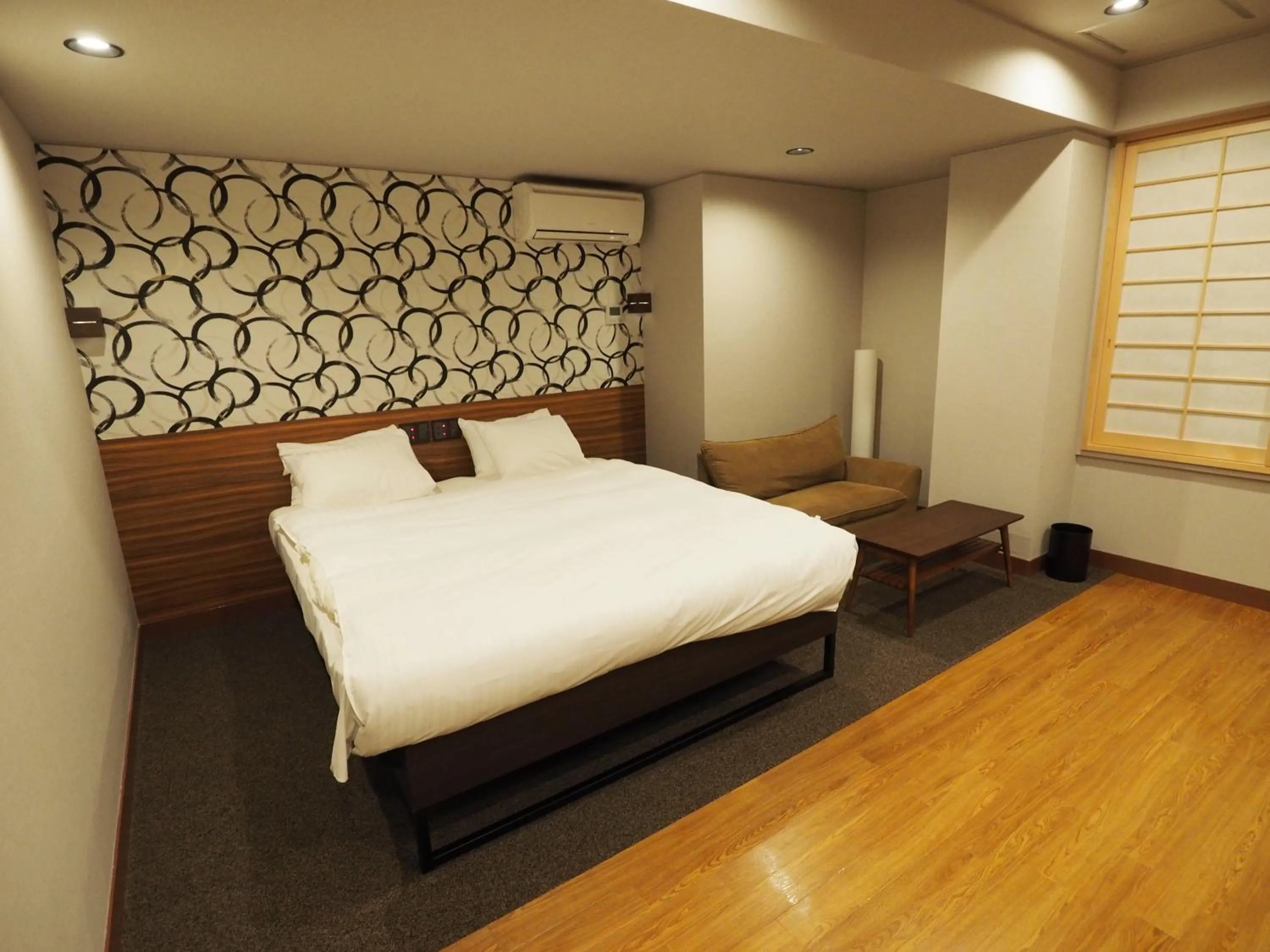 Bed in Hotel Be-zen shimanouchi