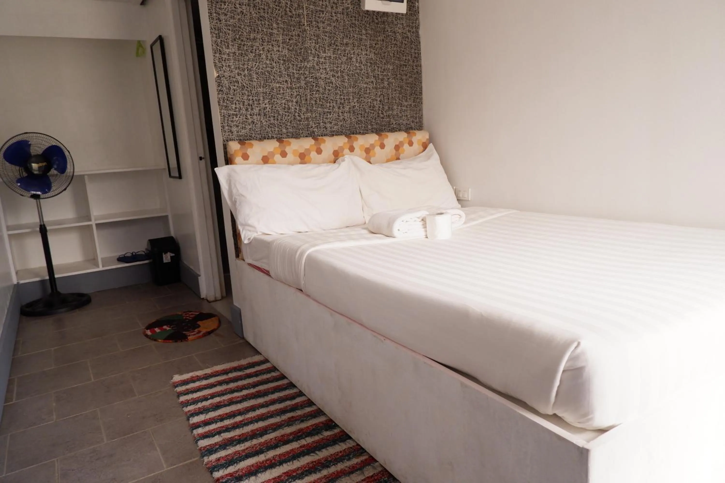 Bed in Sunset View Ridge Residences