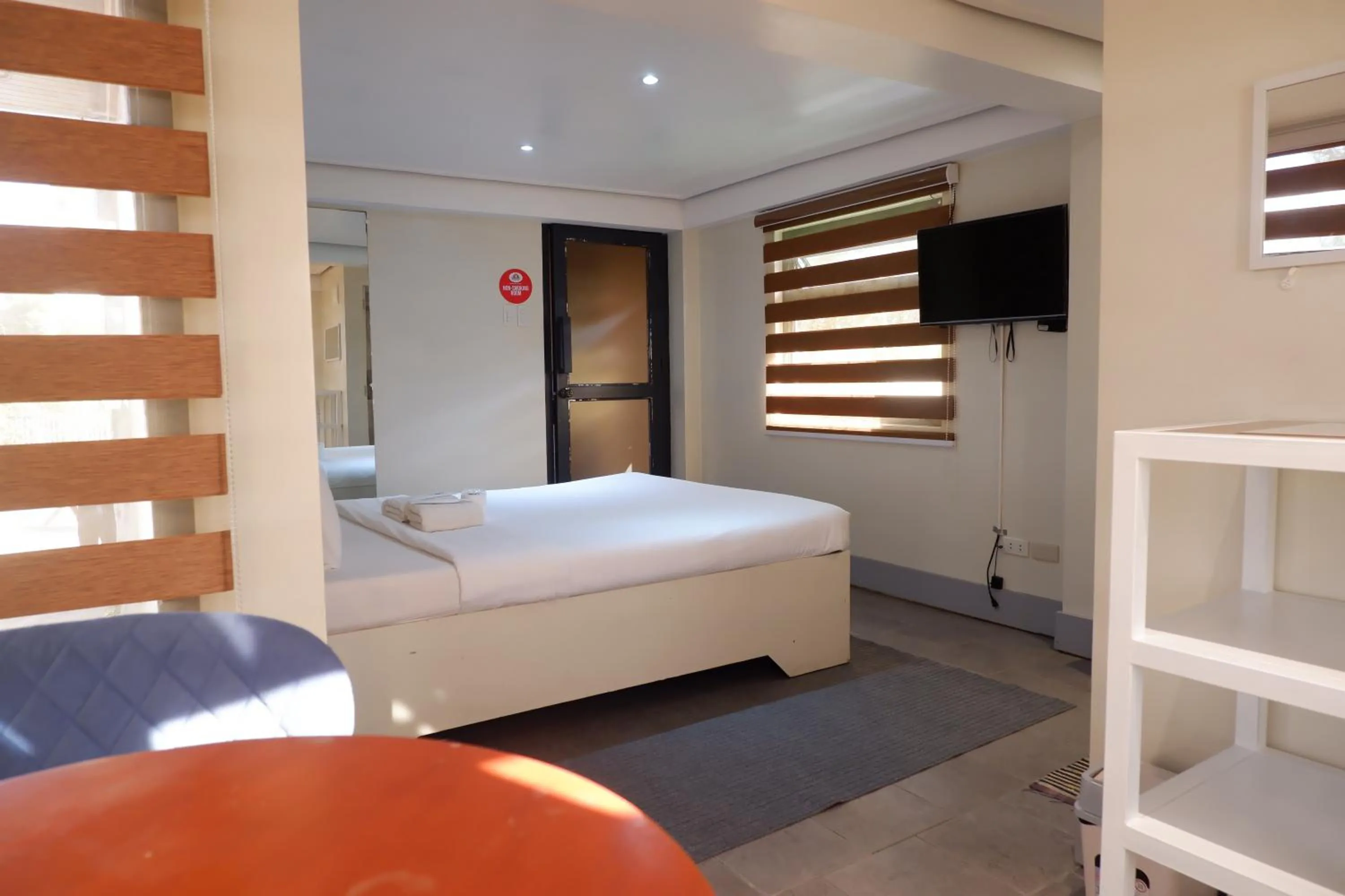 Bed in Sunset View Ridge Residences