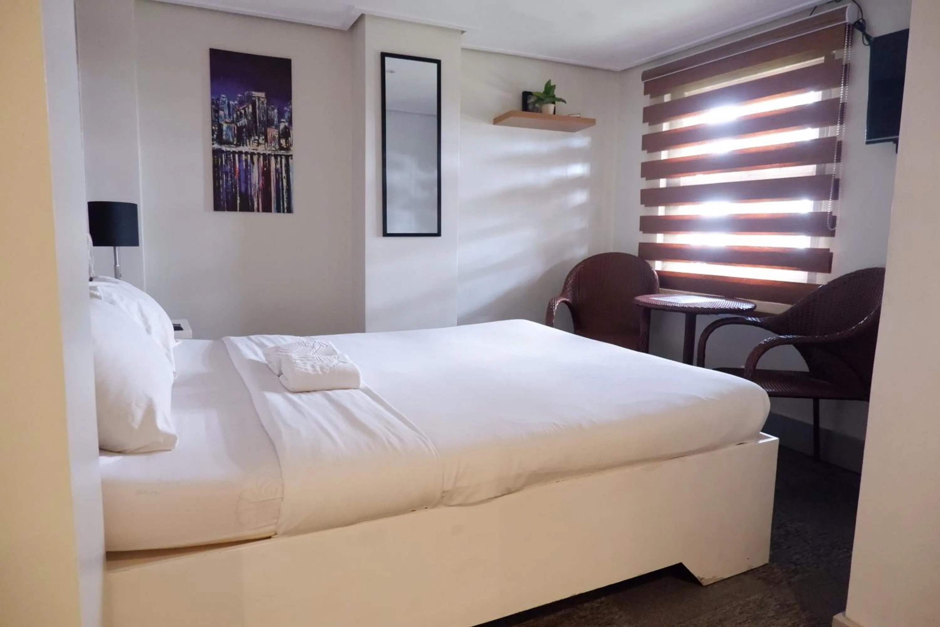 Bed in Sunset View Ridge Residences