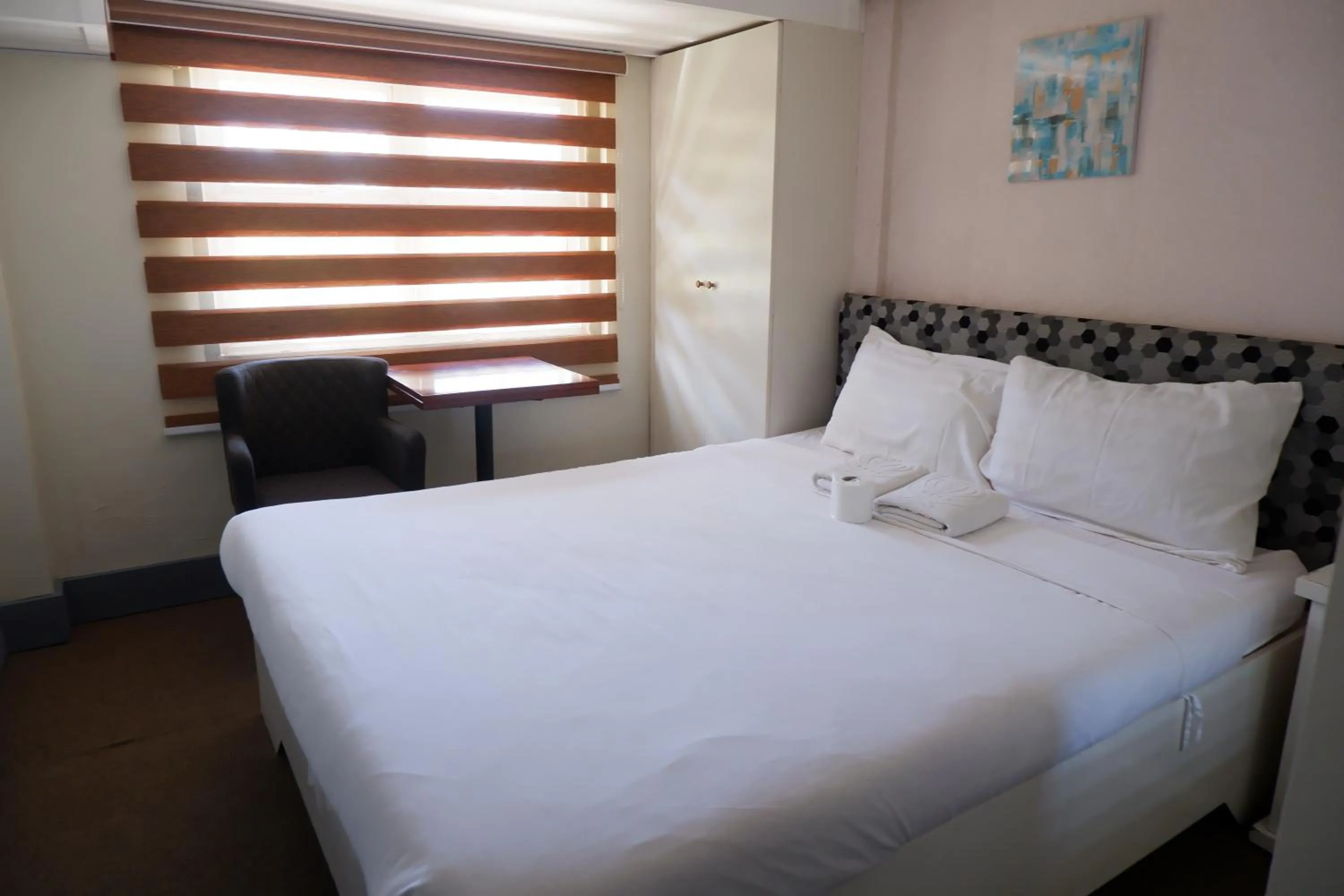 Bed in Sunset View Ridge Residences