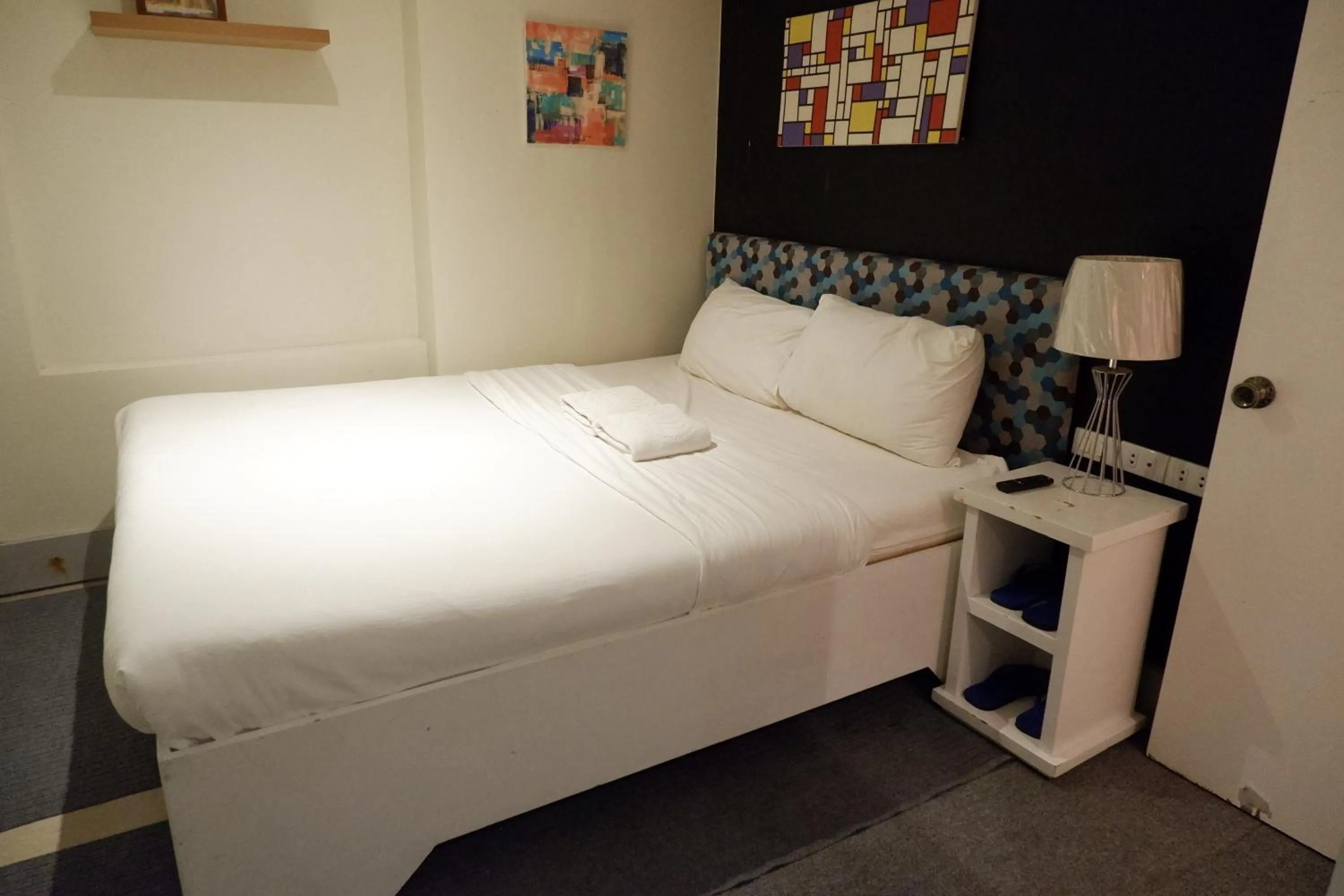 Bed in Sunset View Ridge Residences