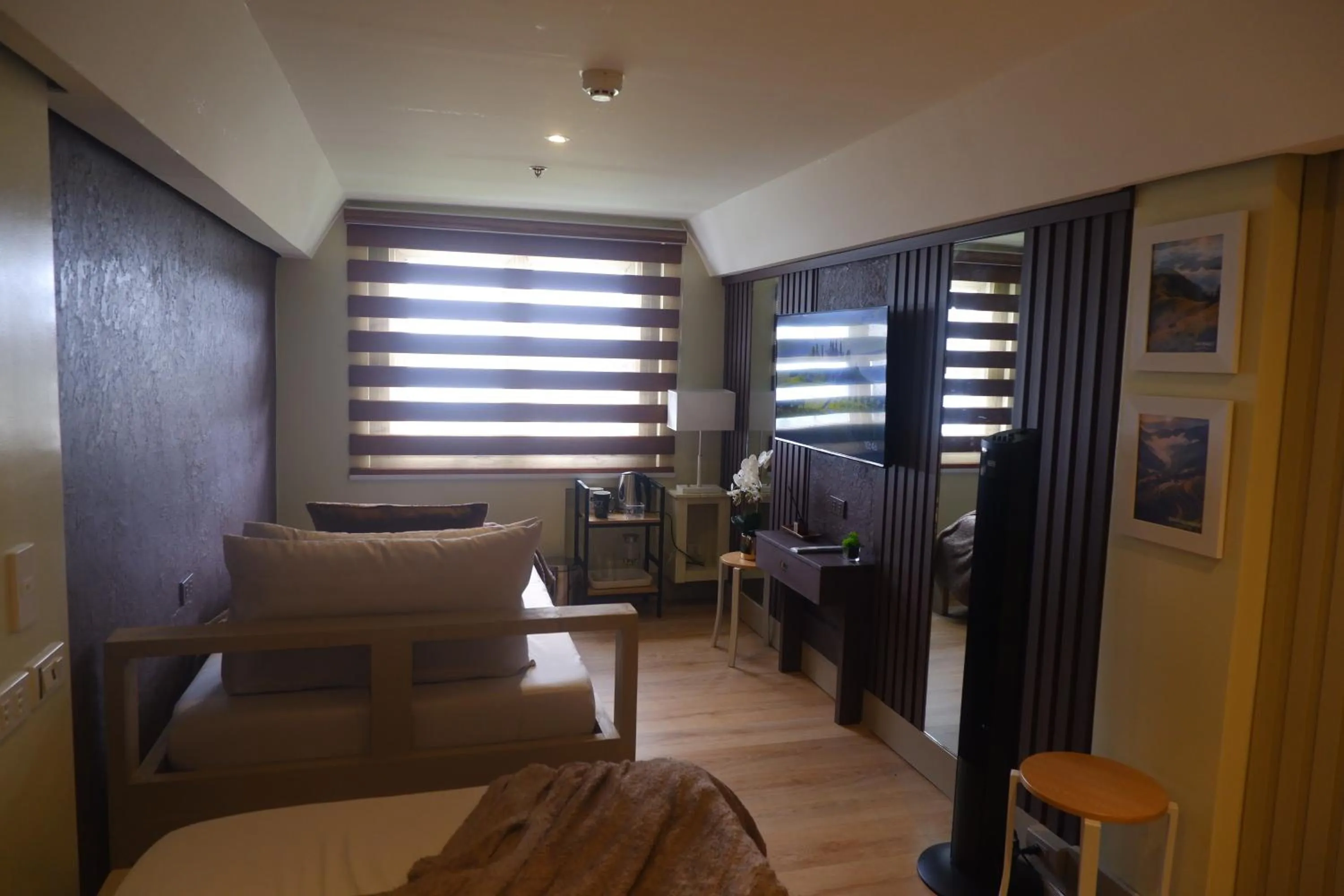 Bed in Sunset View Ridge Residences