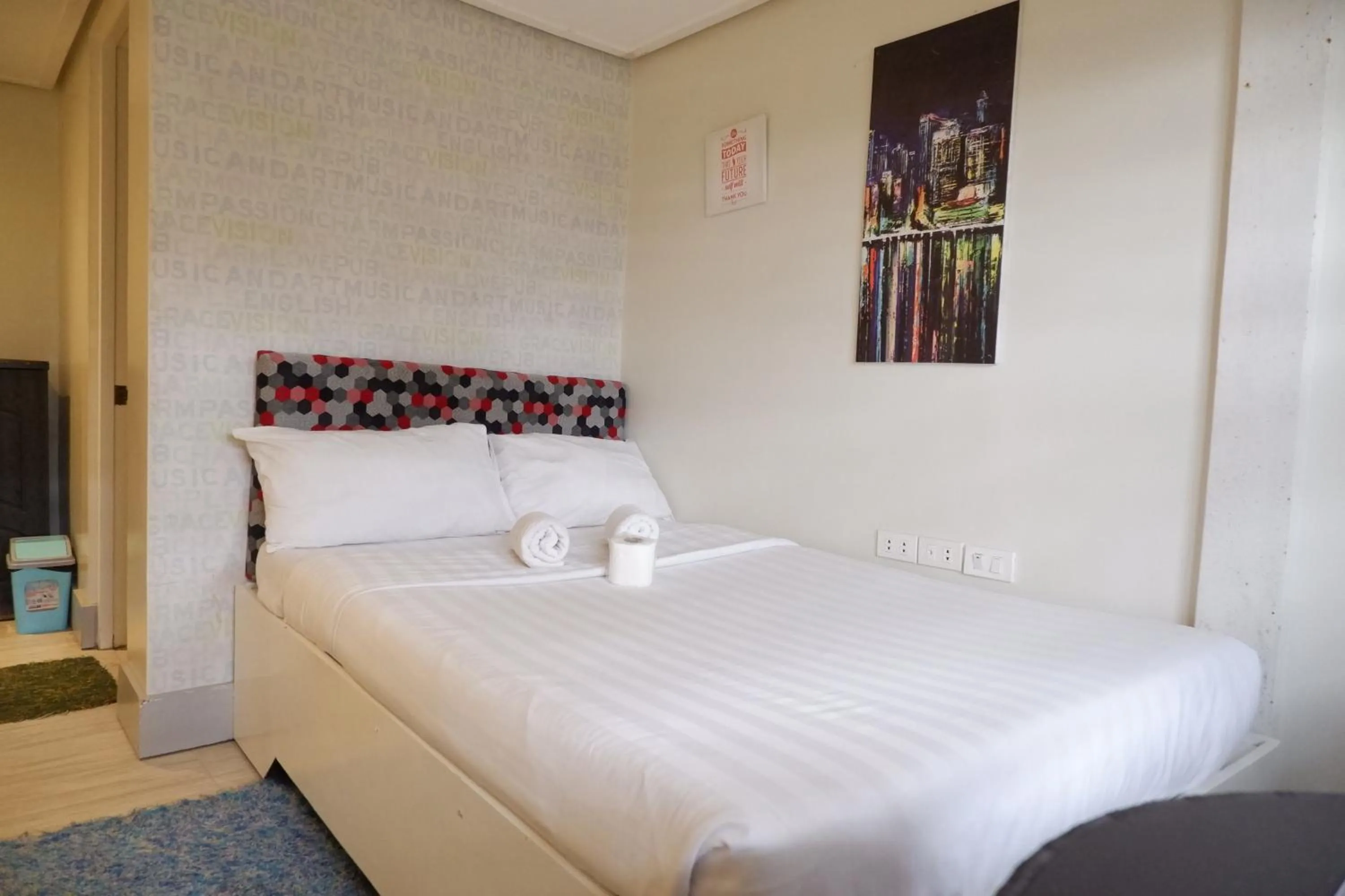 Bed in Sunset View Ridge Residences