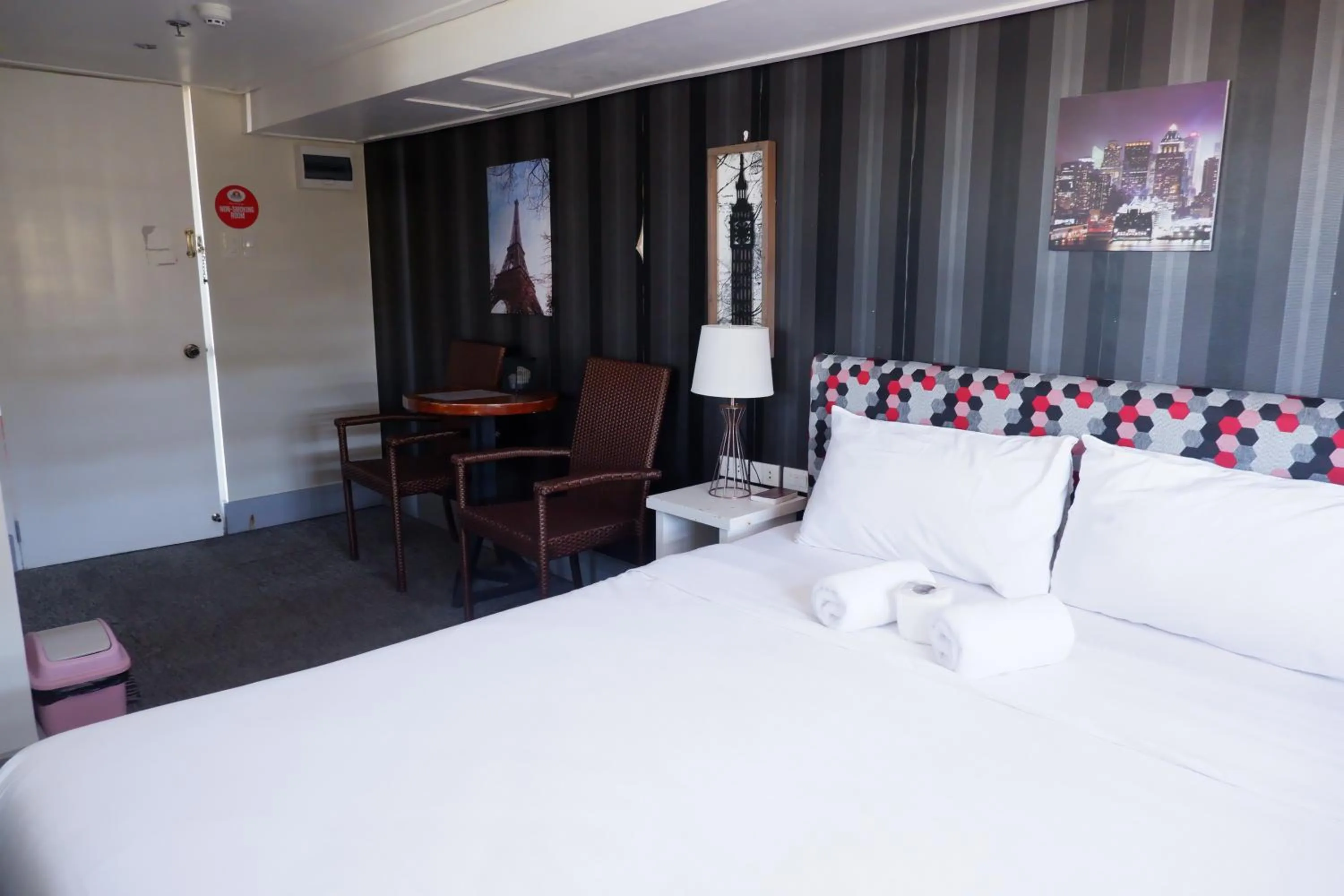 Bed in Sunset View Ridge Residences