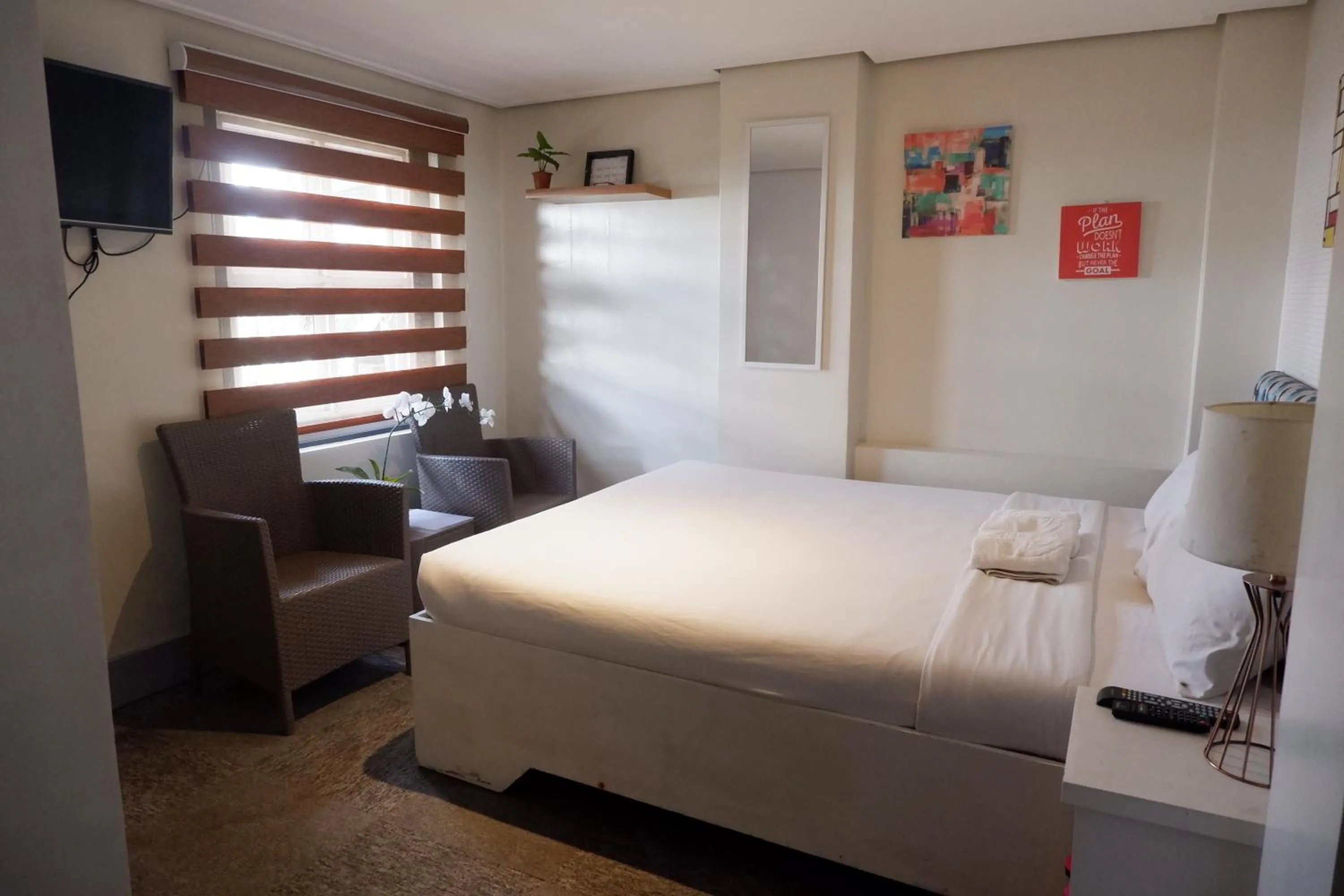 Bed in Sunset View Ridge Residences