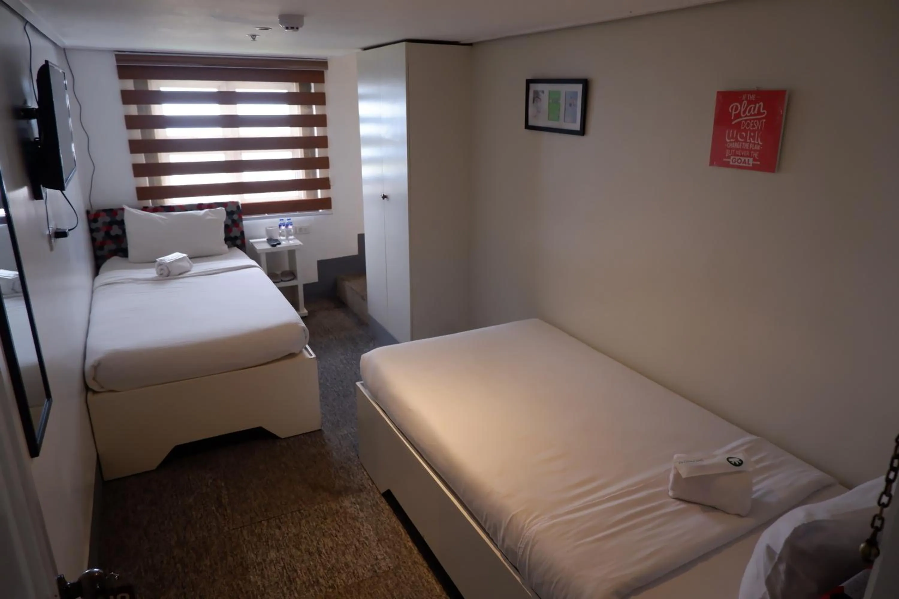 Bed in Sunset View Ridge Residences