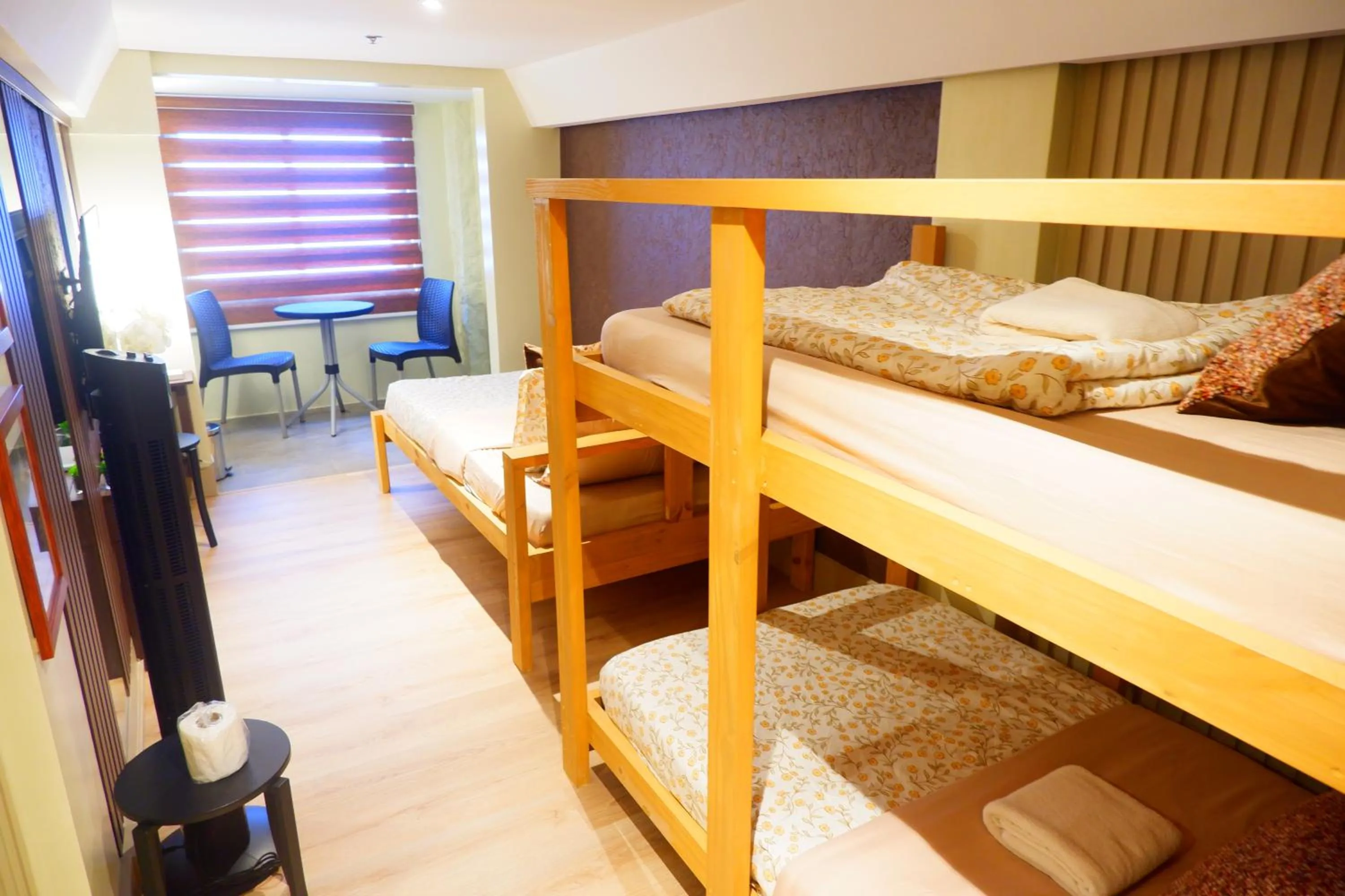 Bed in Sunset View Ridge Residences