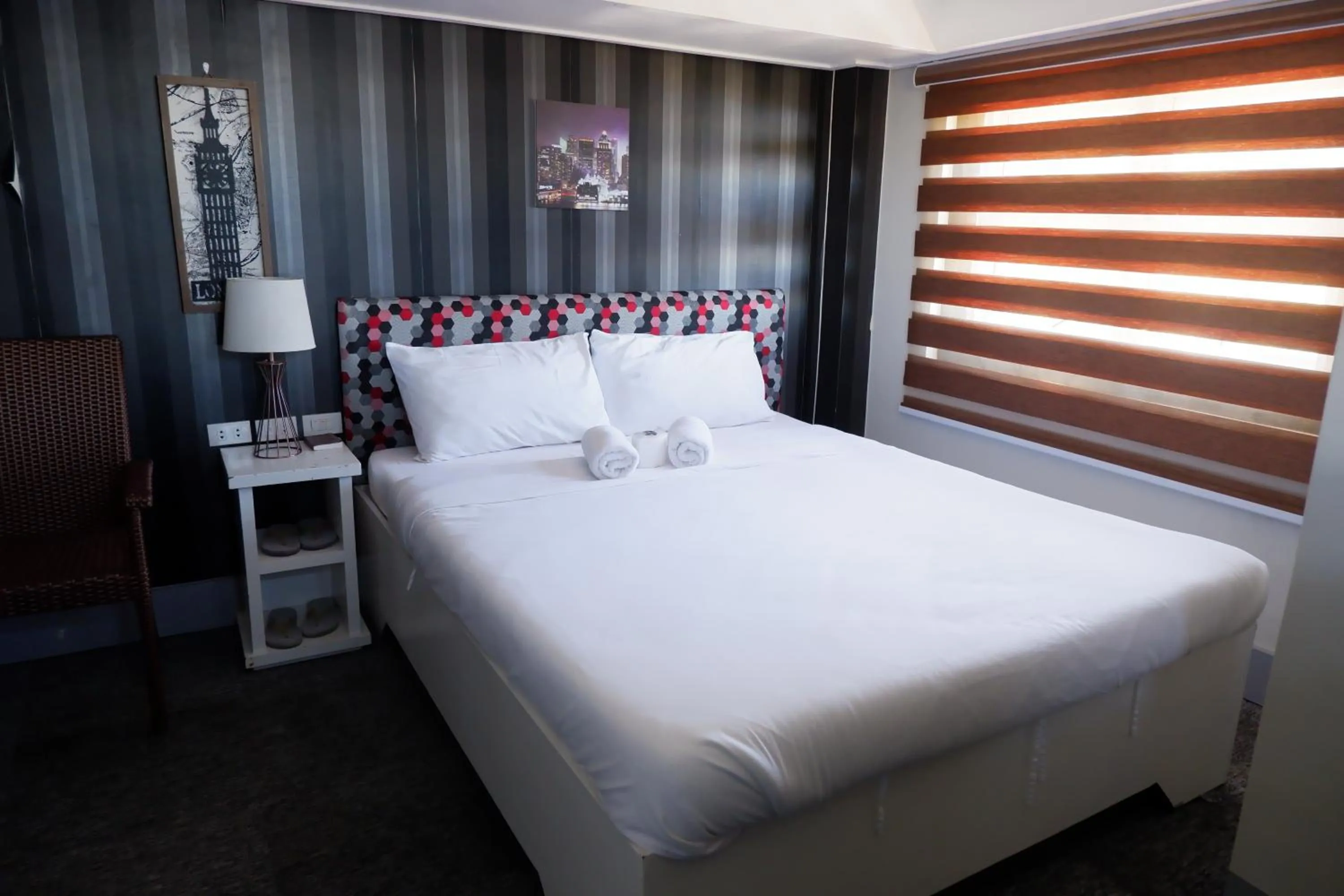 Bed in Sunset View Ridge Residences