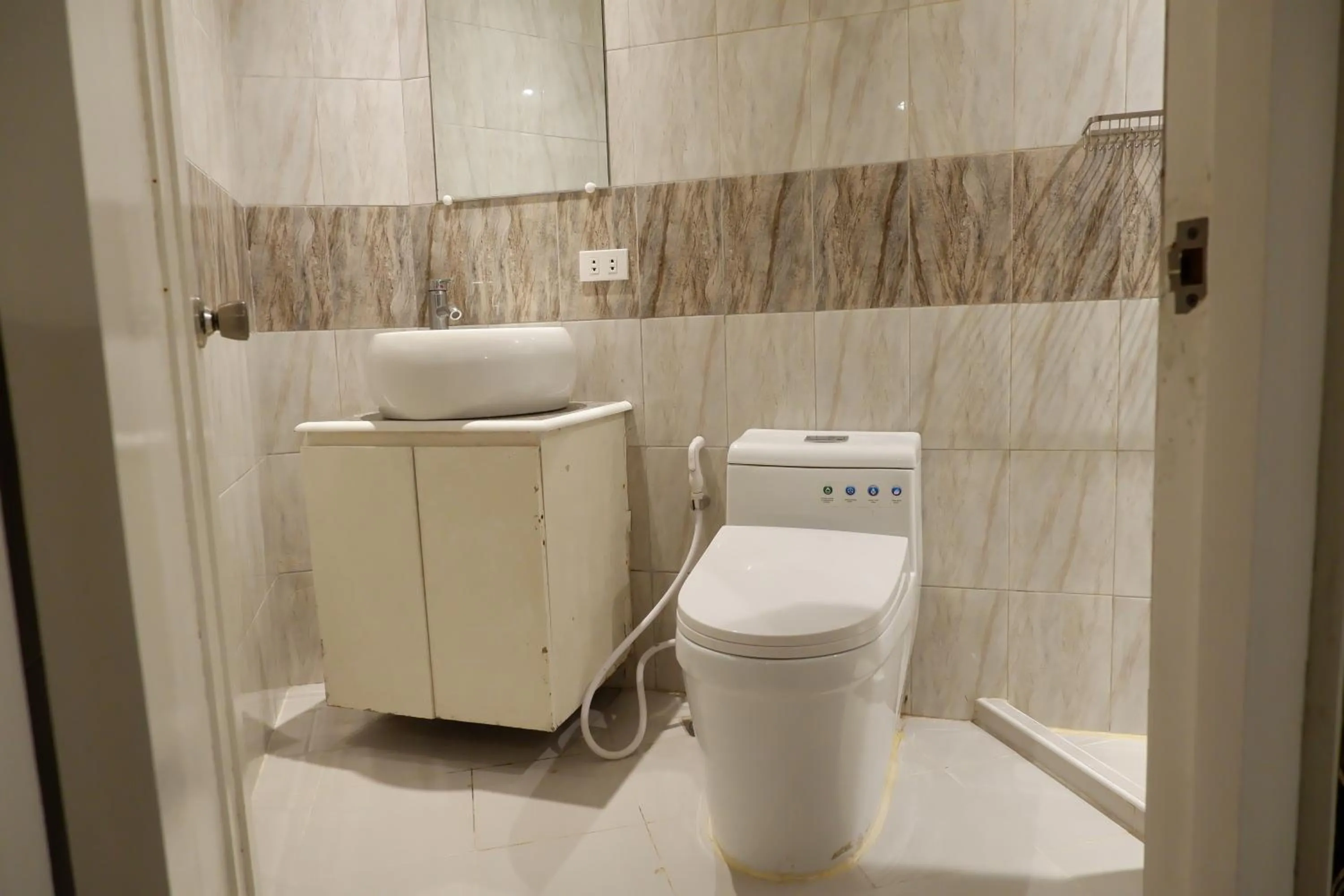 Toilet in Sunset View Ridge Residences
