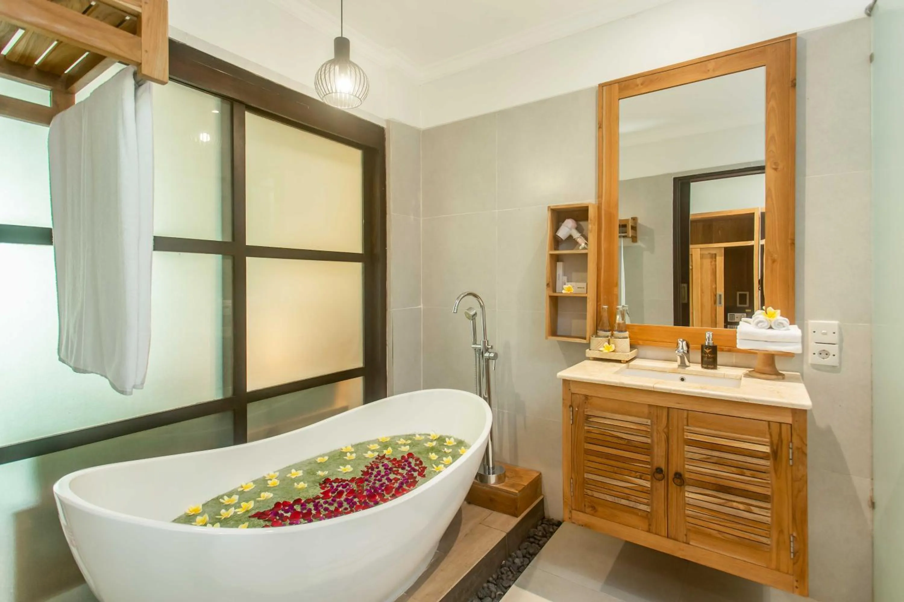 Bath in Manah Shanti Suites by GenuineHost