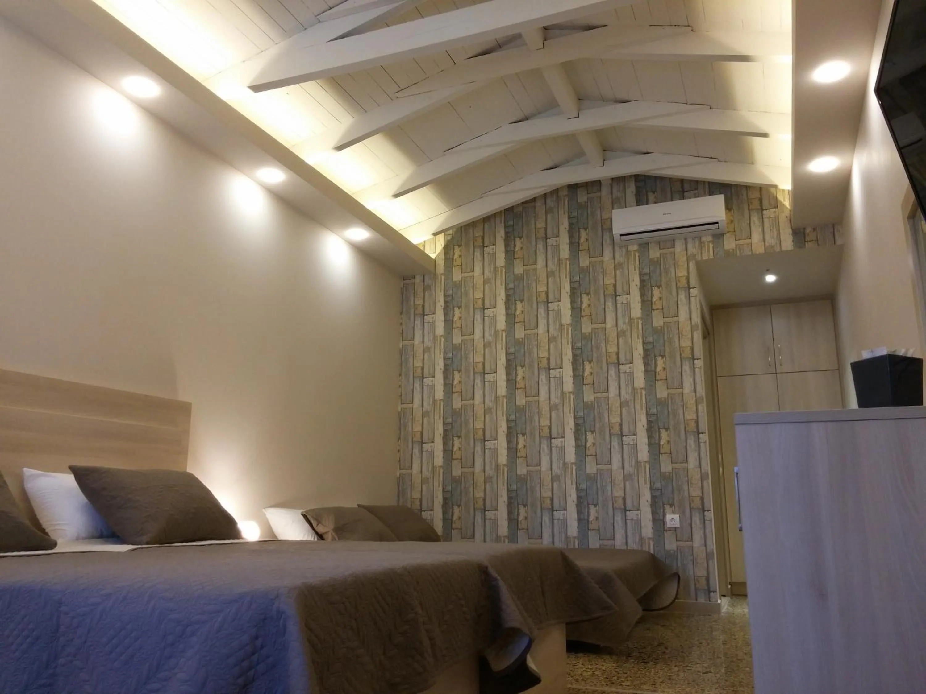 Bed in Anetis Beach Hotel