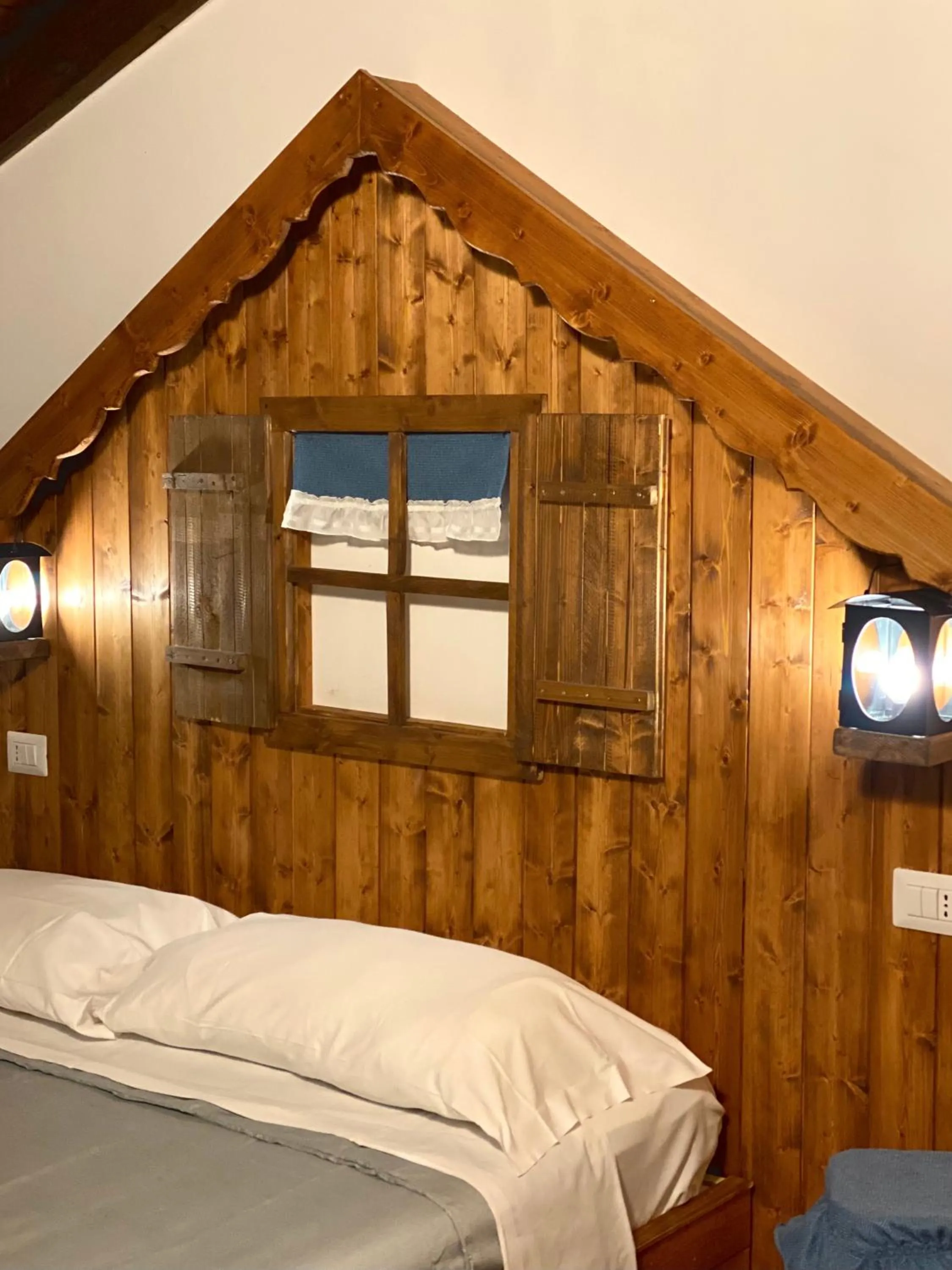 Bed in Enjoy Ledro B&B