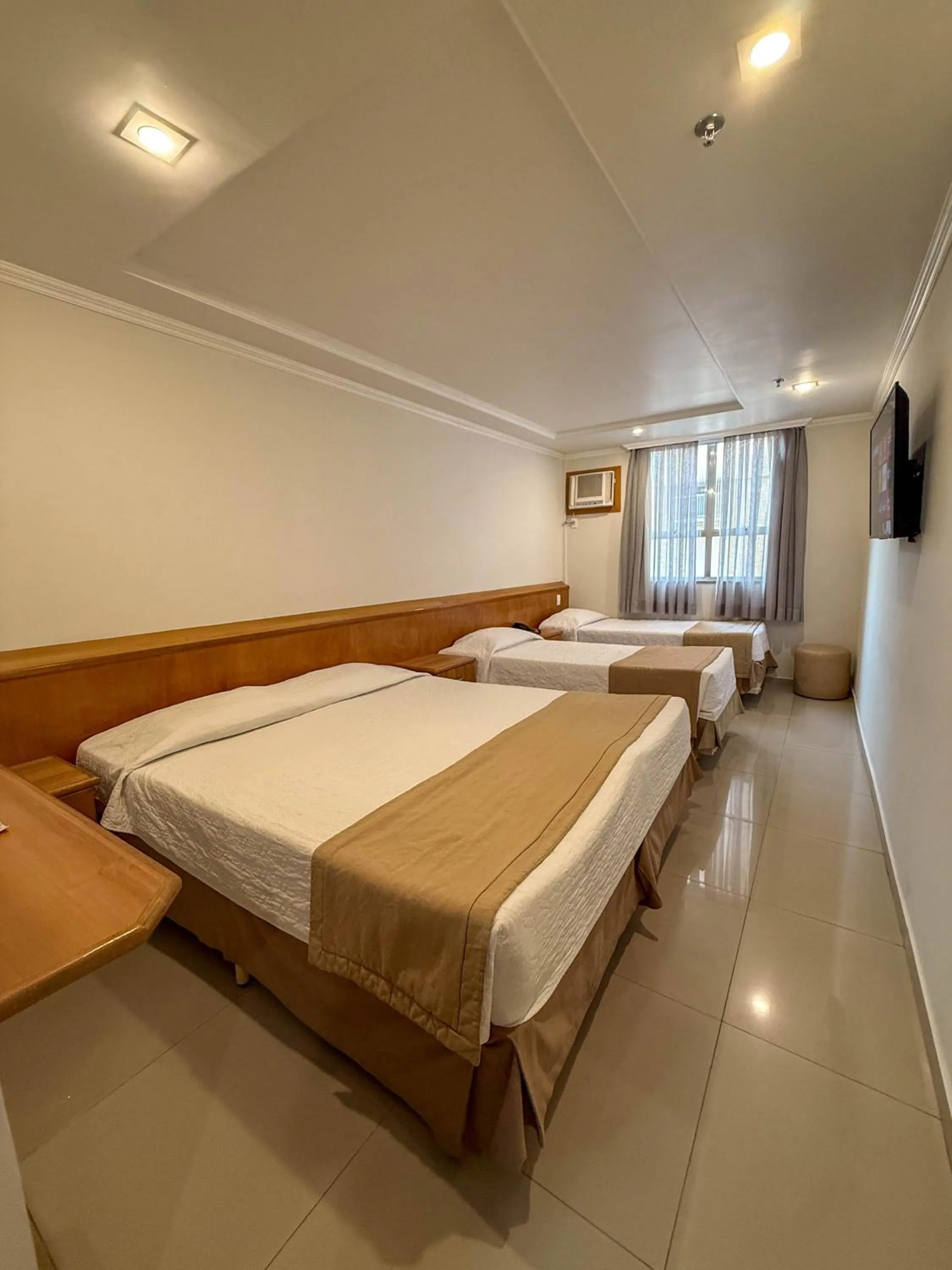 Bed in Saionara Hotel