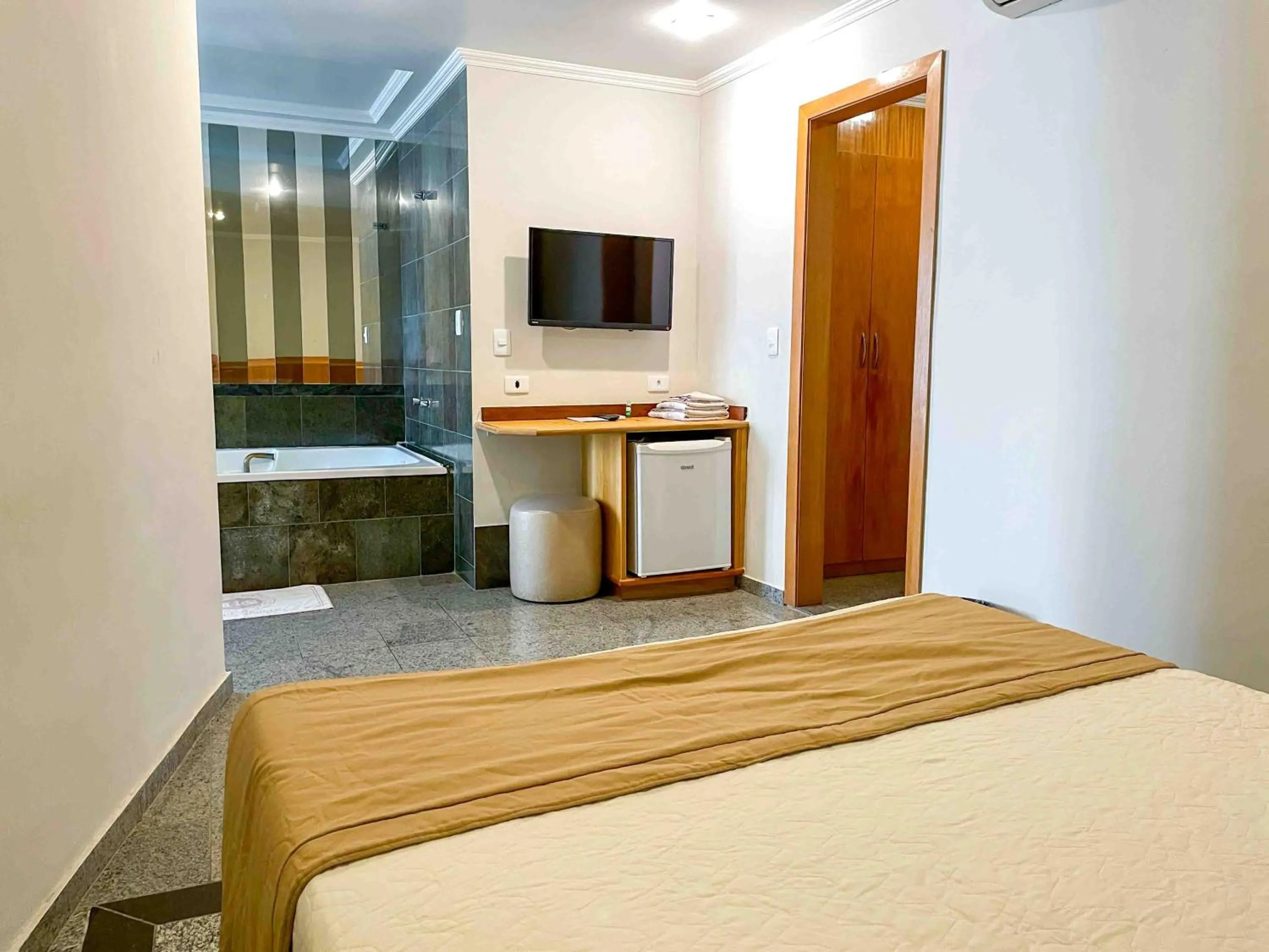 Bed in Saionara Hotel