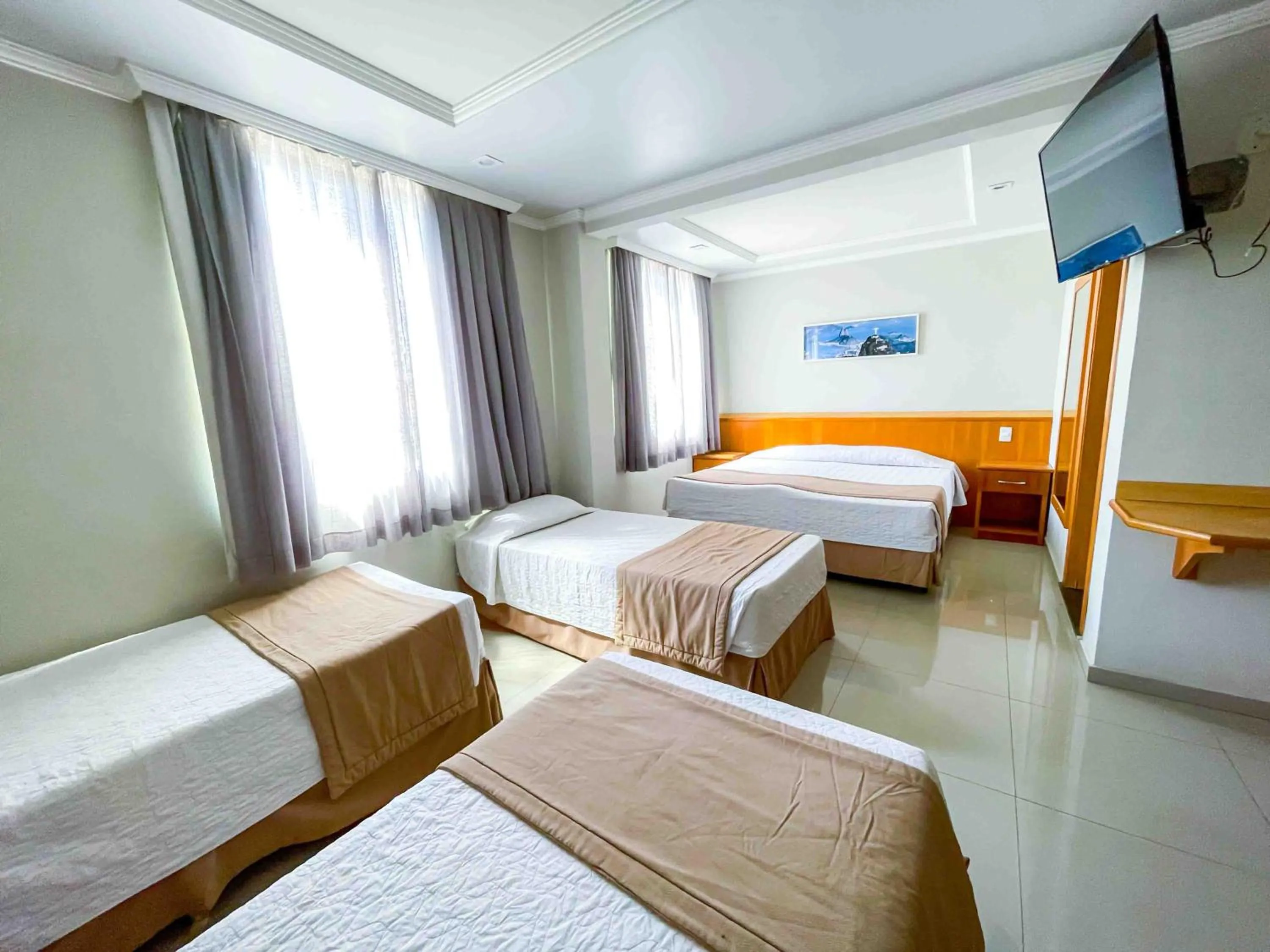 Bed in Saionara Hotel